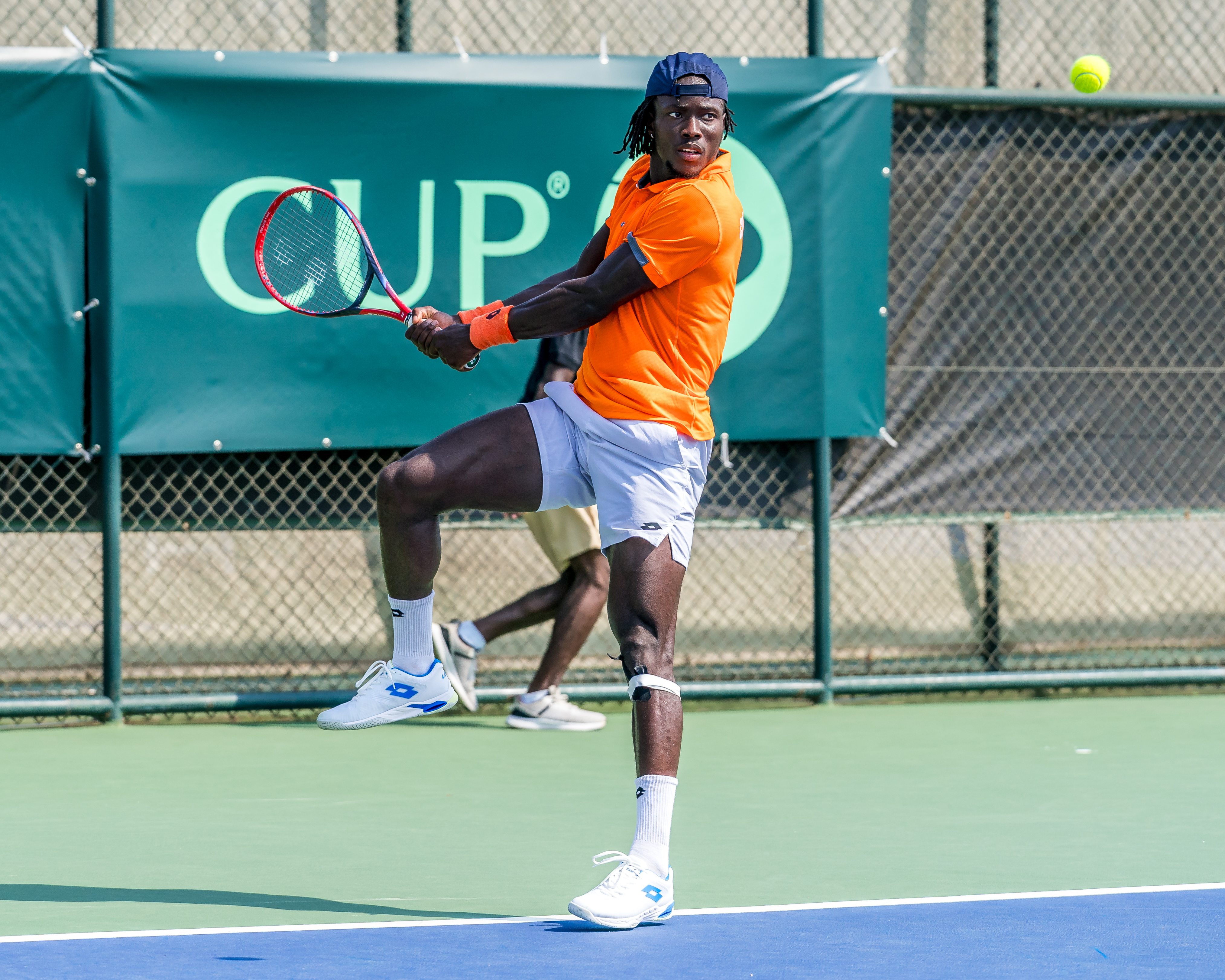 Eliakim Coulibaly hits a backhand