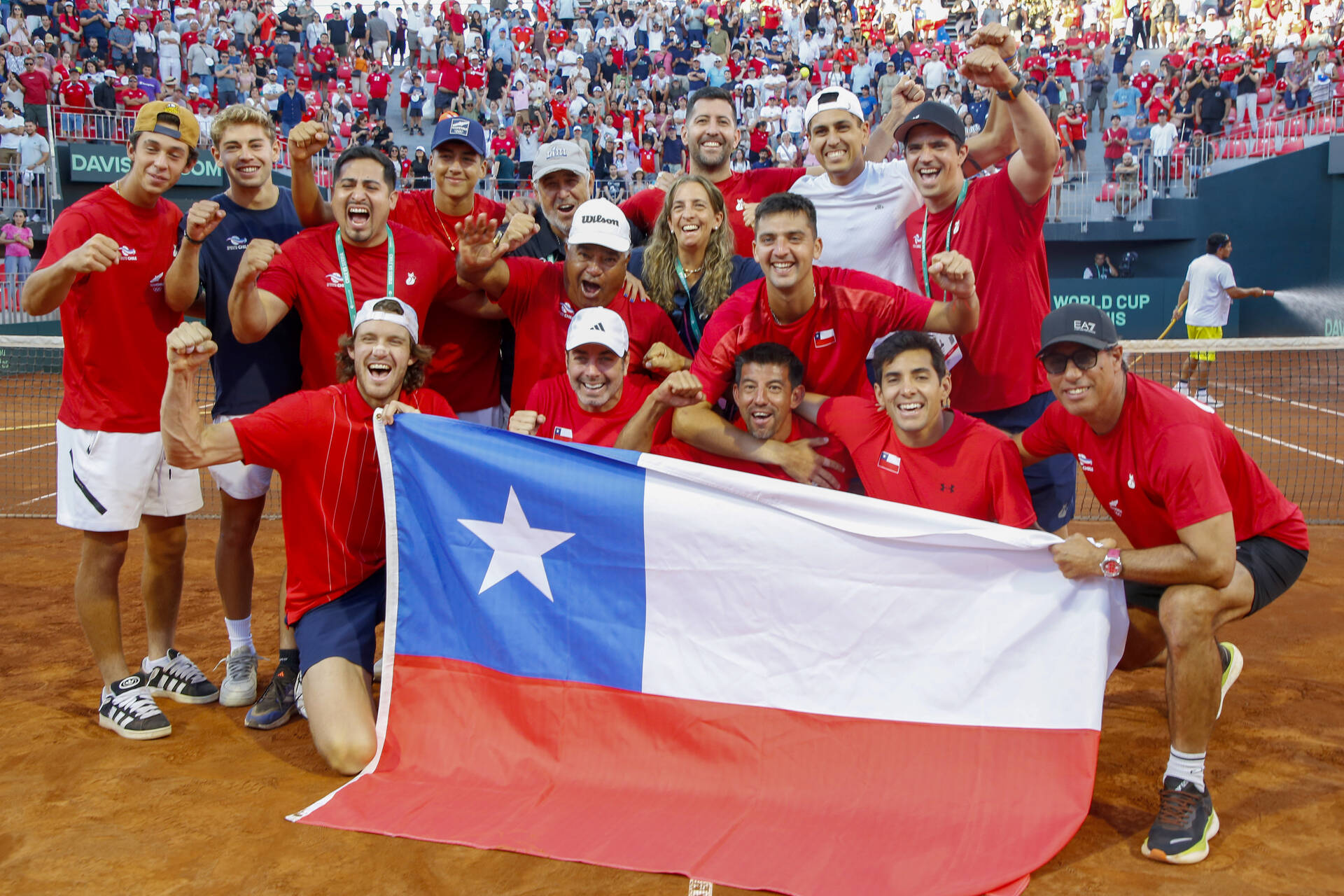 Chile celebrates after beating Serbia