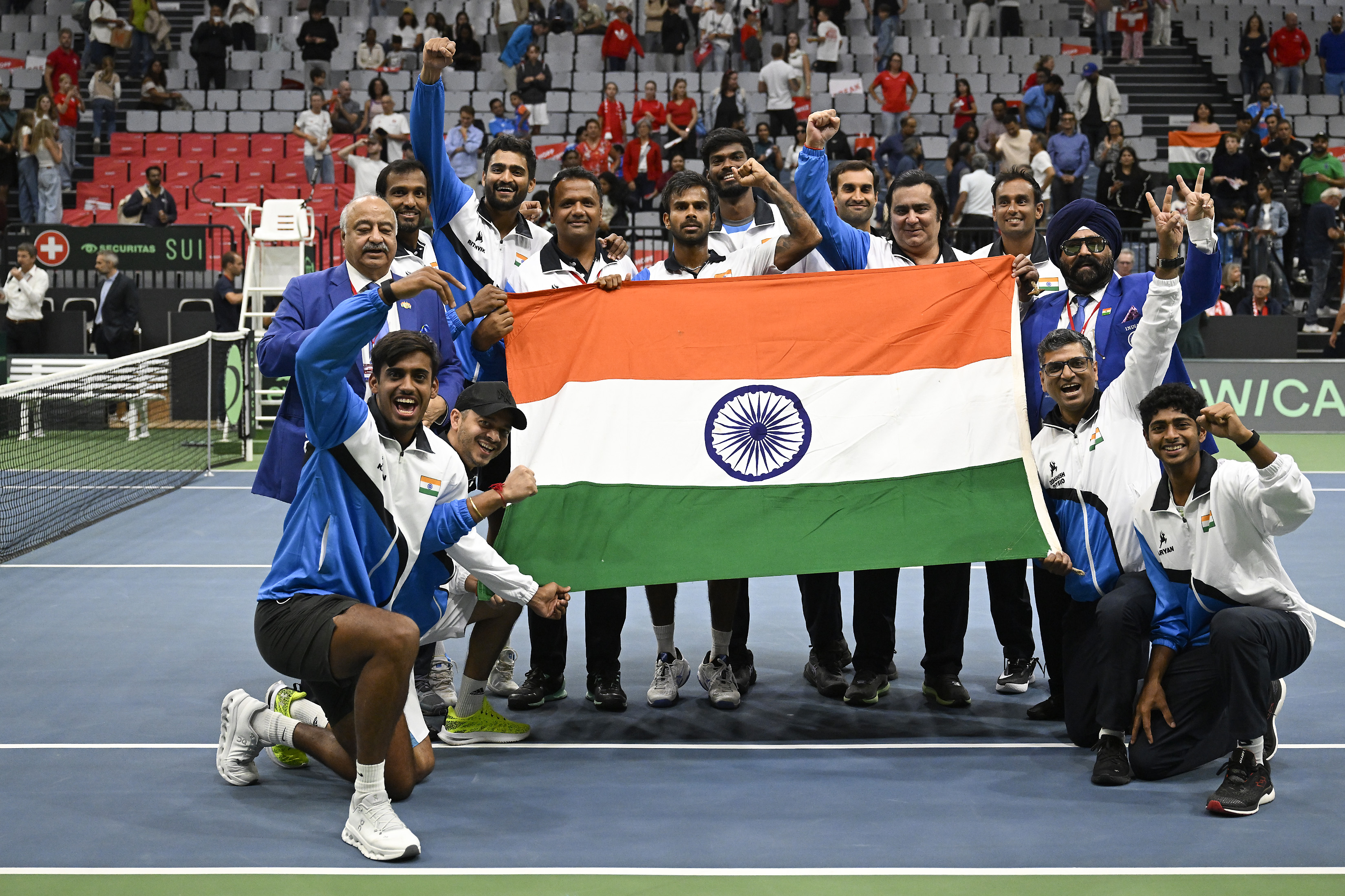 India celebrate after winning promotion