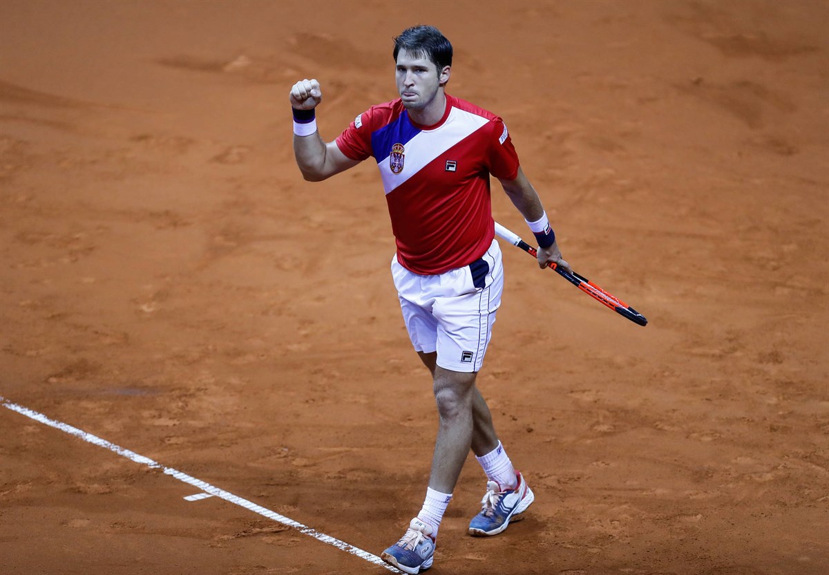 Serbia dominate singles rubbers to move to brink of victory