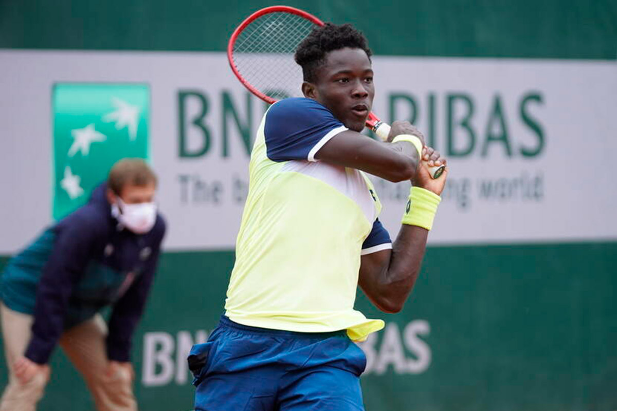 Eliakim Coulibaly hits a backhand