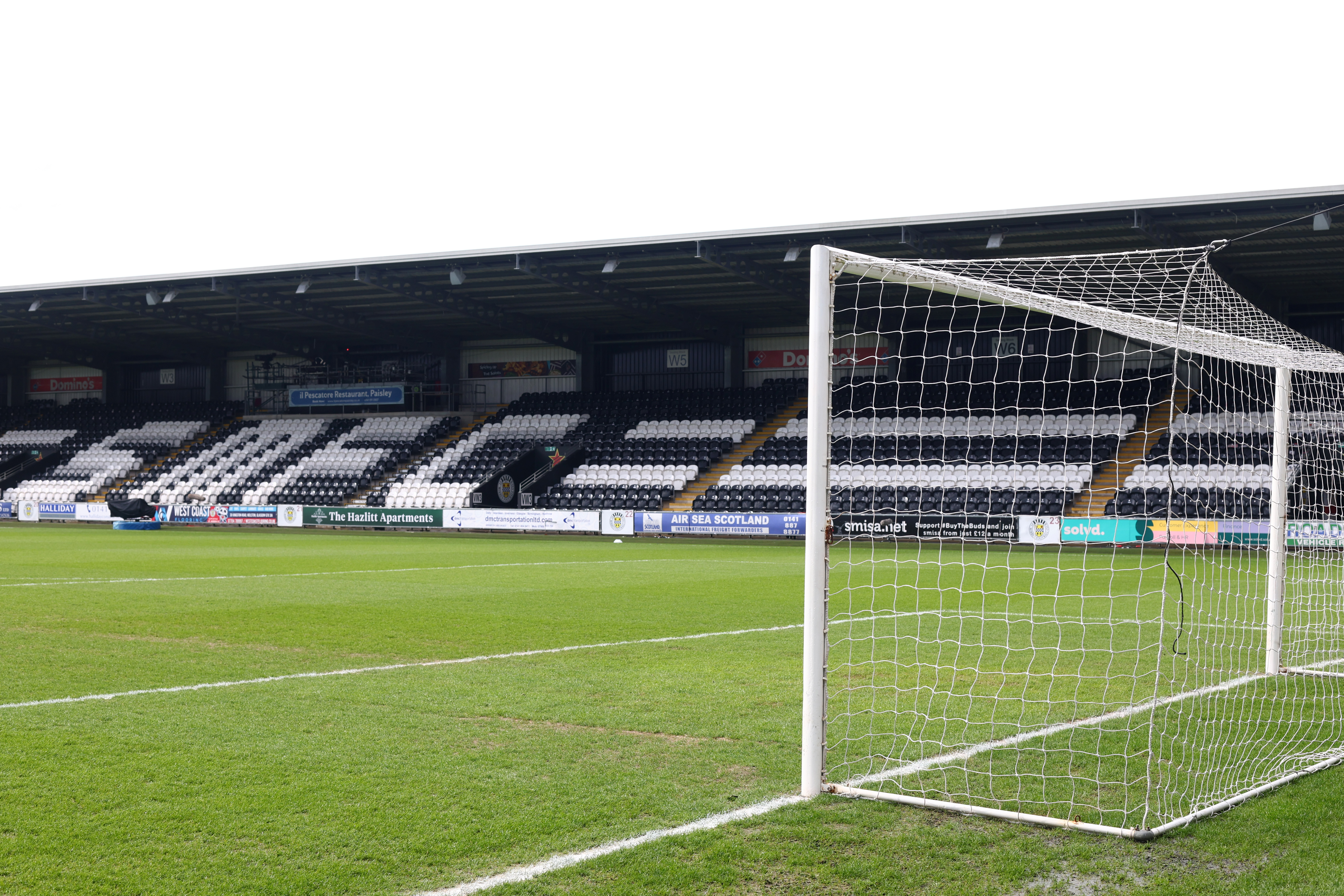 Rangers players celebrating a goal against St Mirren