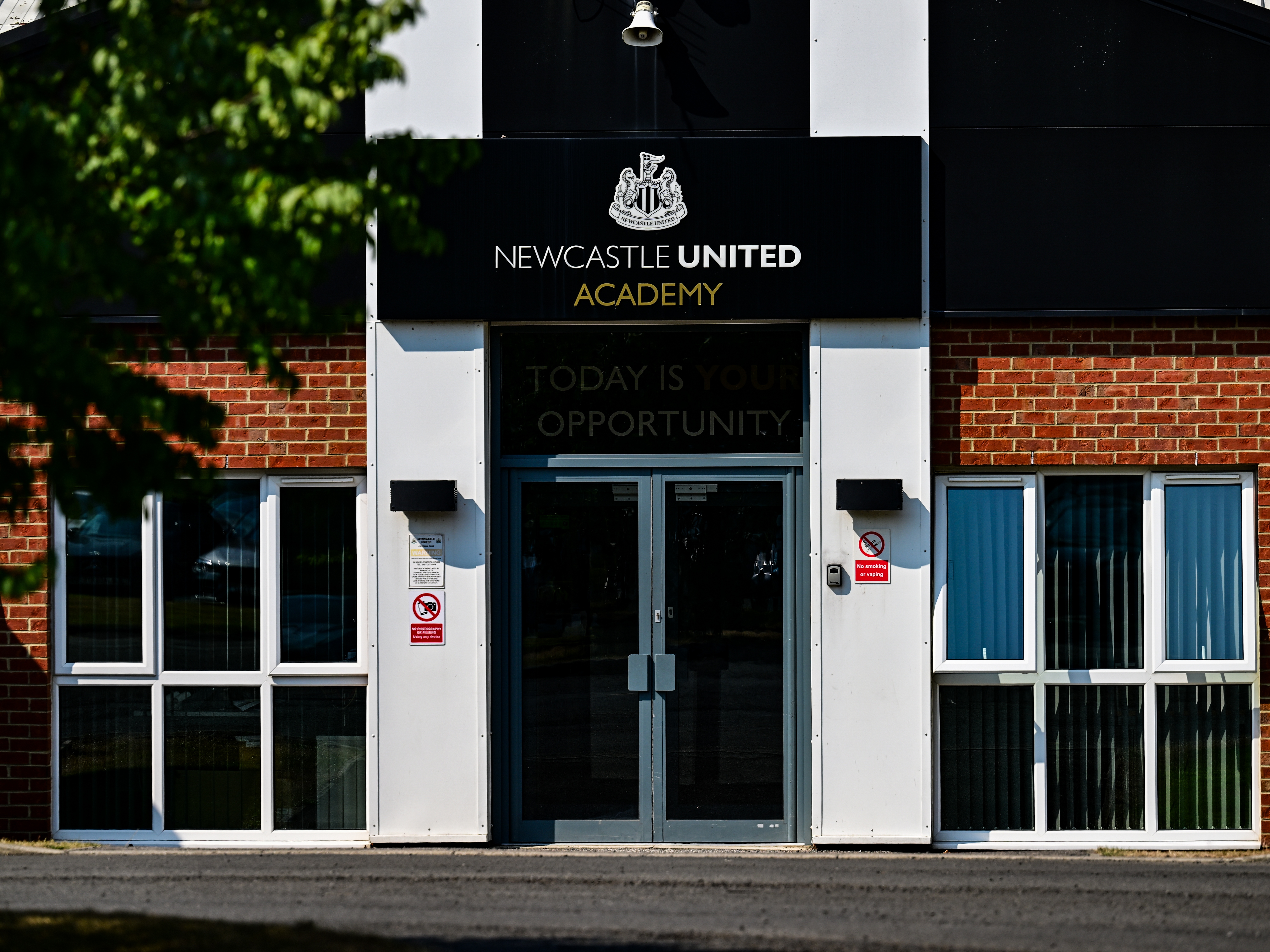 Academy trio sign image