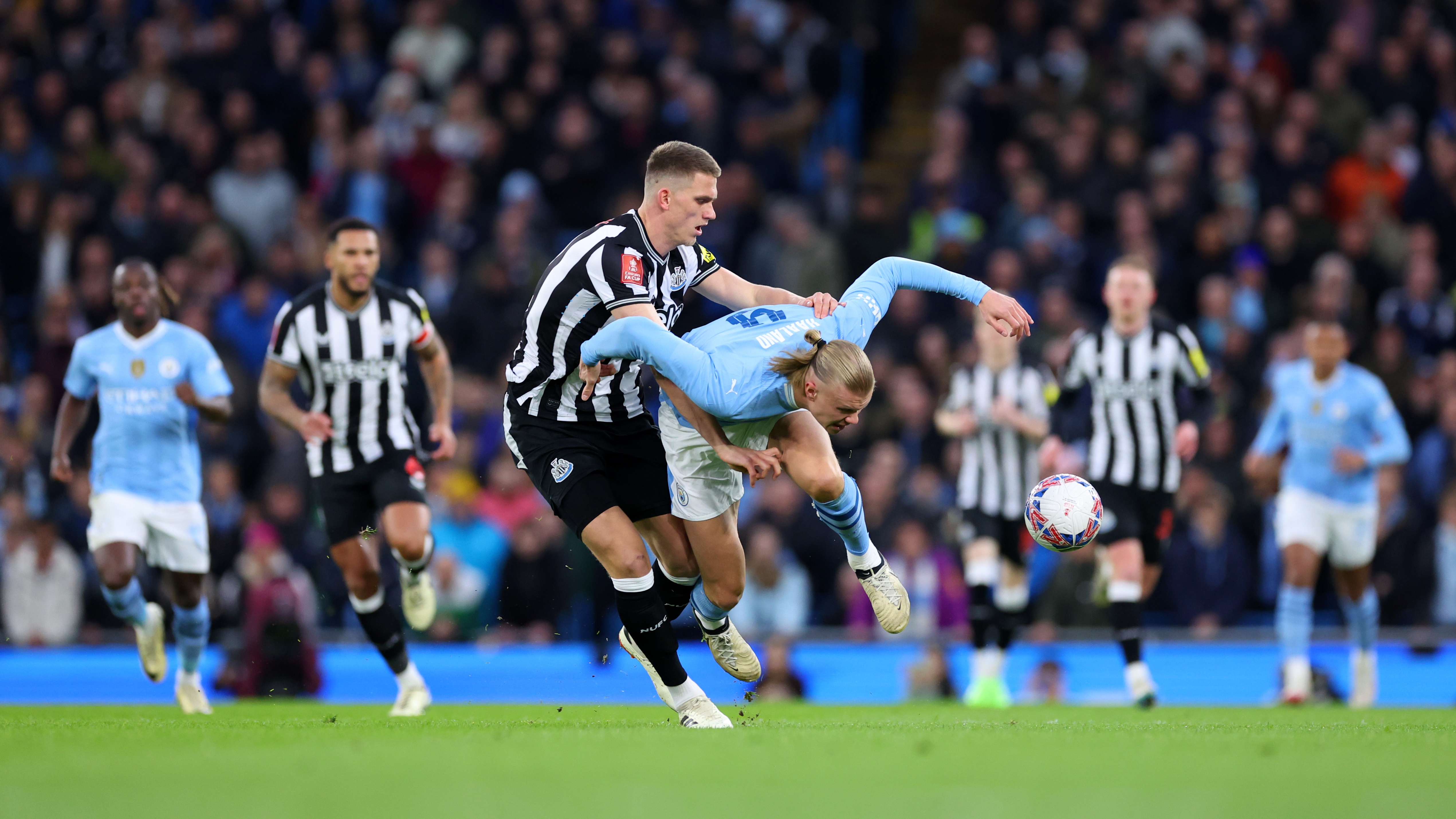 sven-botman-erling-haaland-man-city