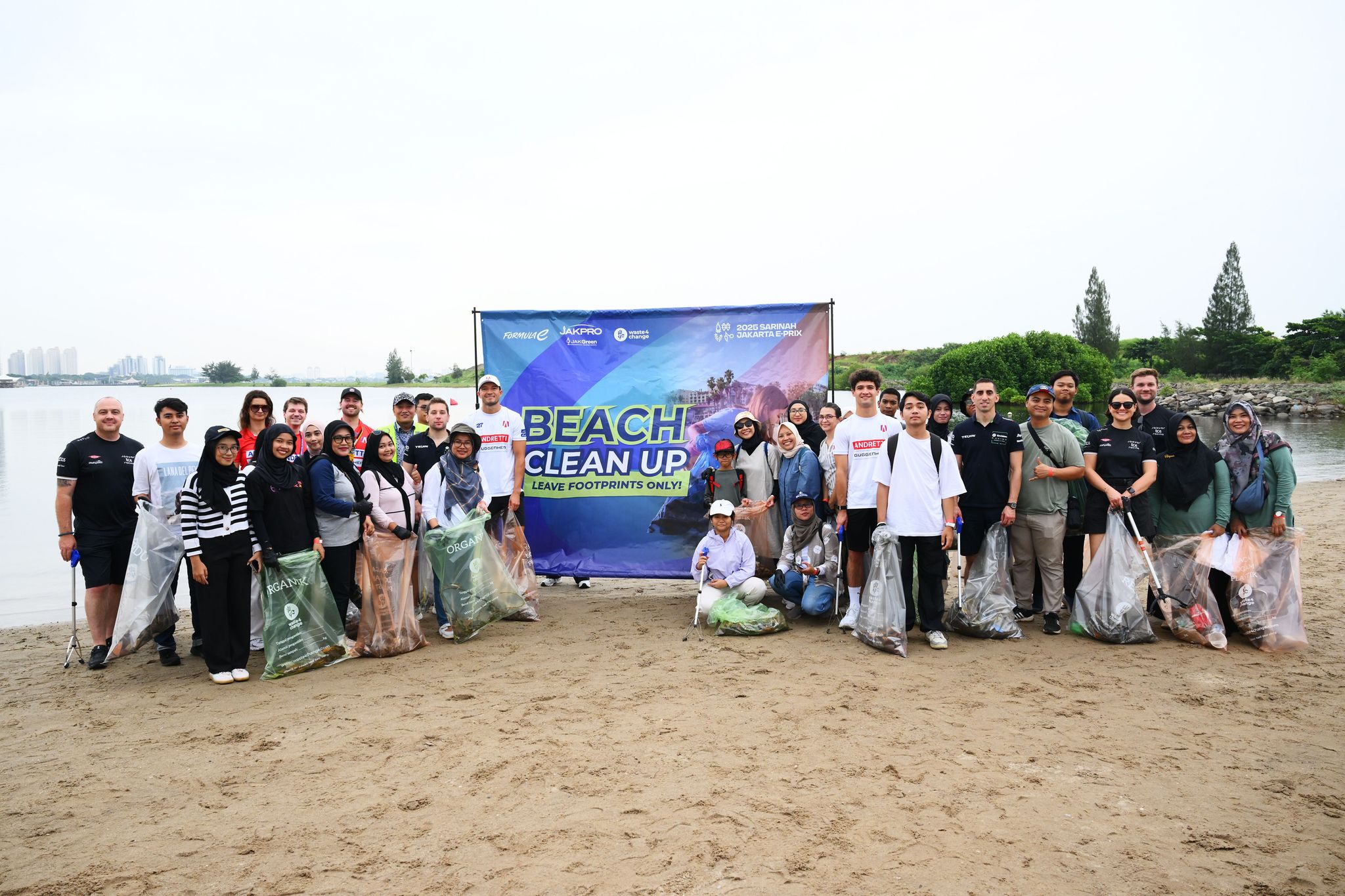 Formula E drivers and teams unite for Pantai Beach clean-up in Jakarta