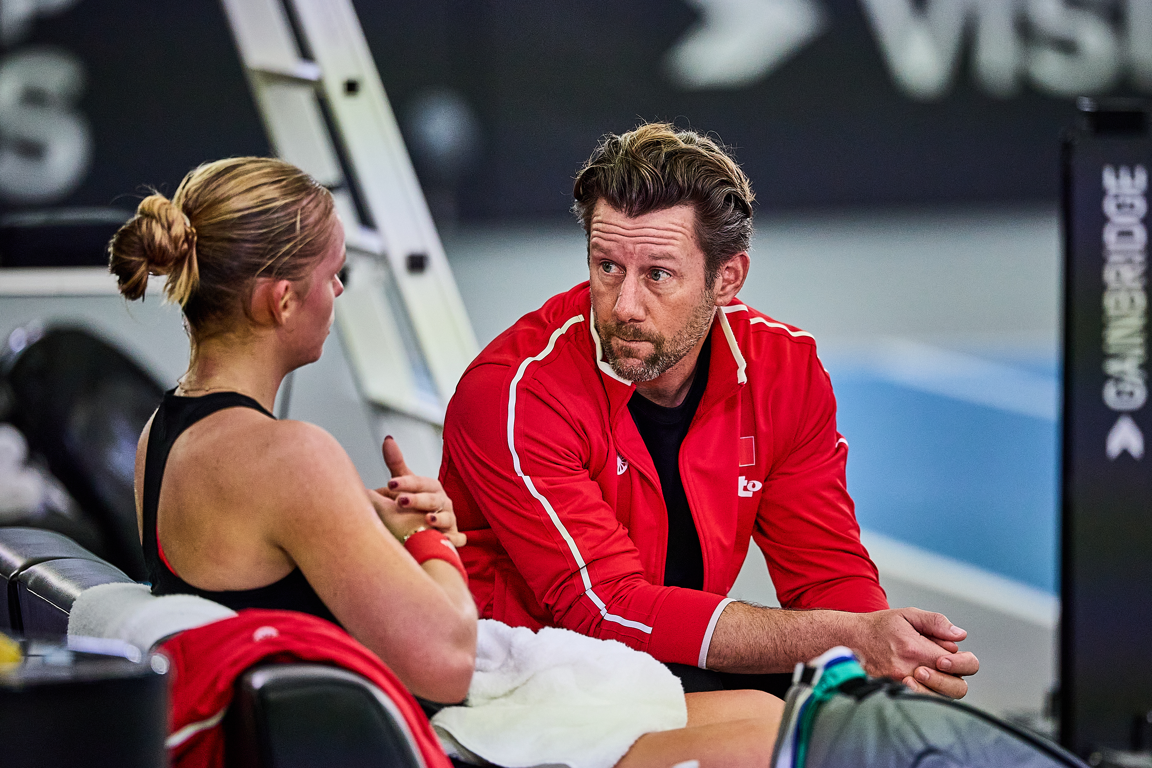 Belgium captain Wim Fissette talking with Jeline Vandromme
