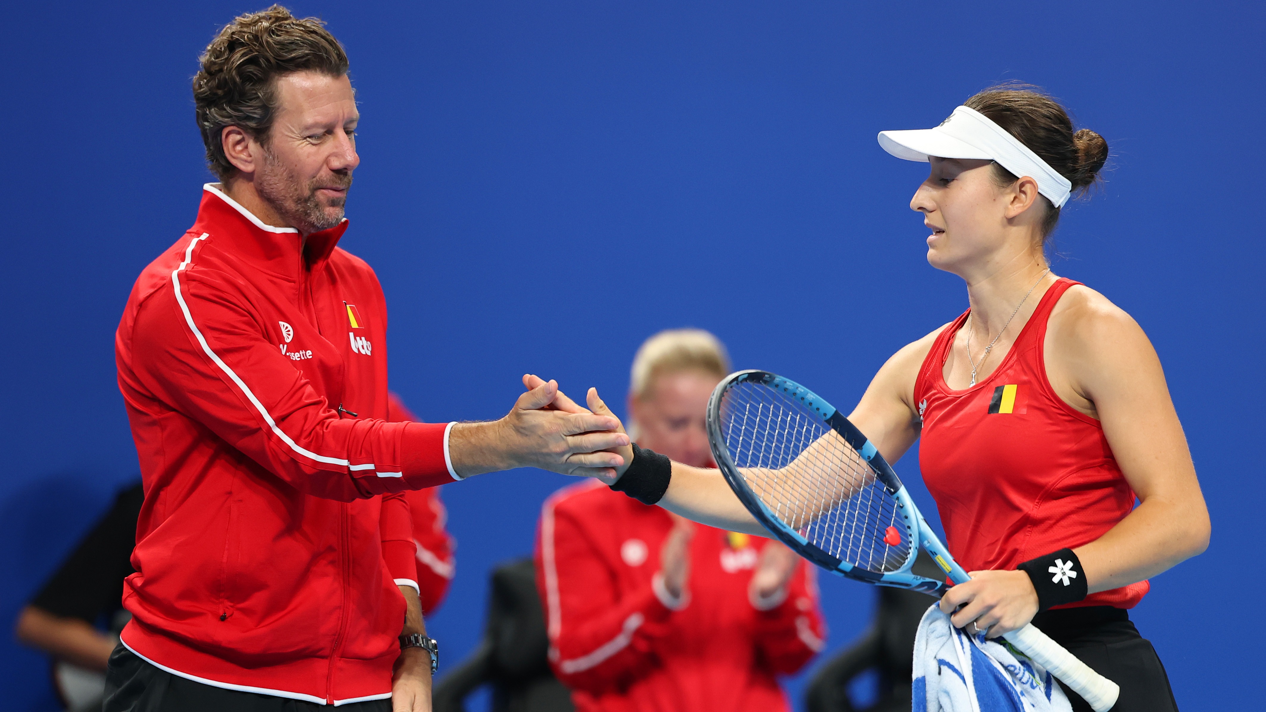 Jana Otzipka and Belgium captain Wim Fissette
