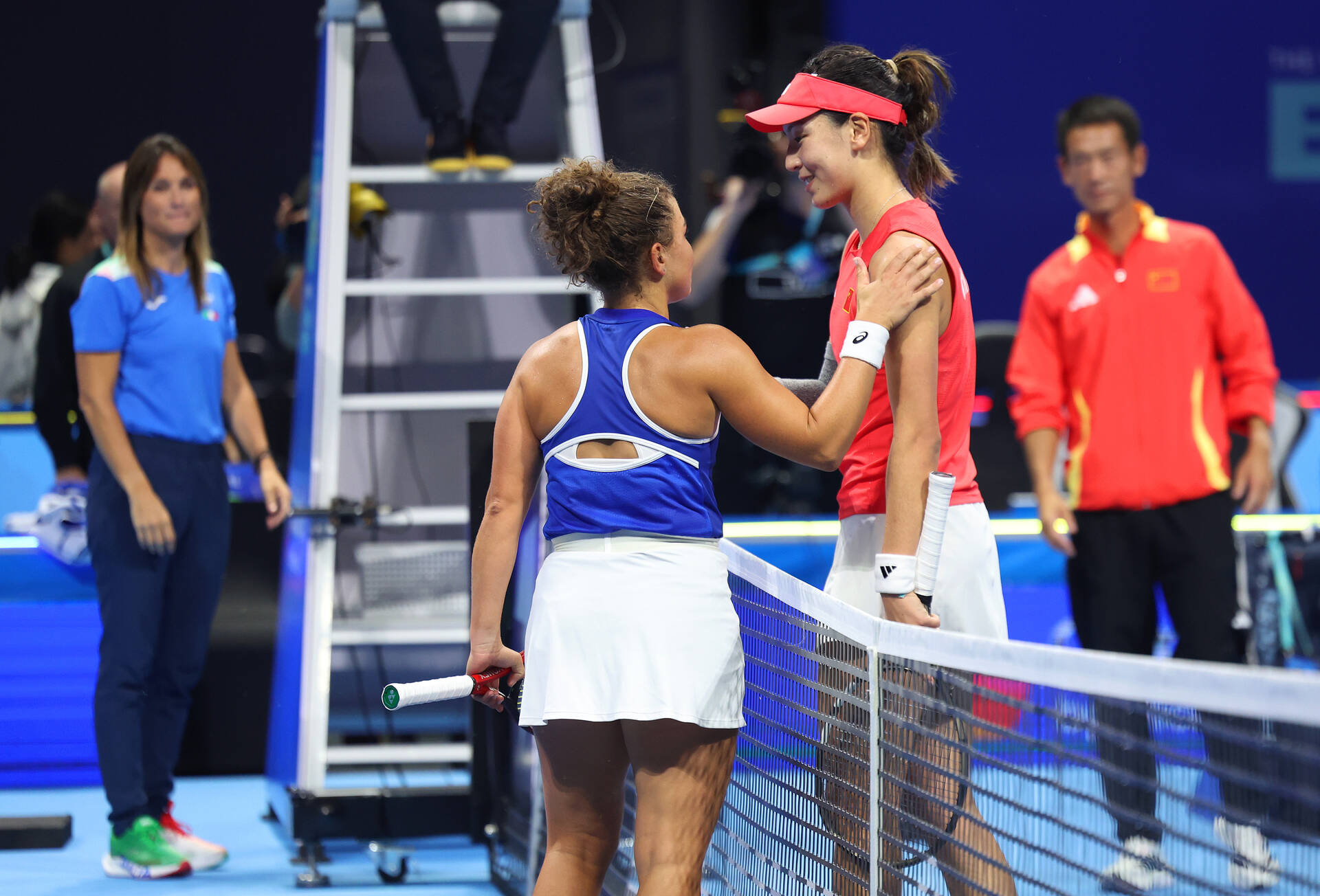 Paolini & Wang handshake