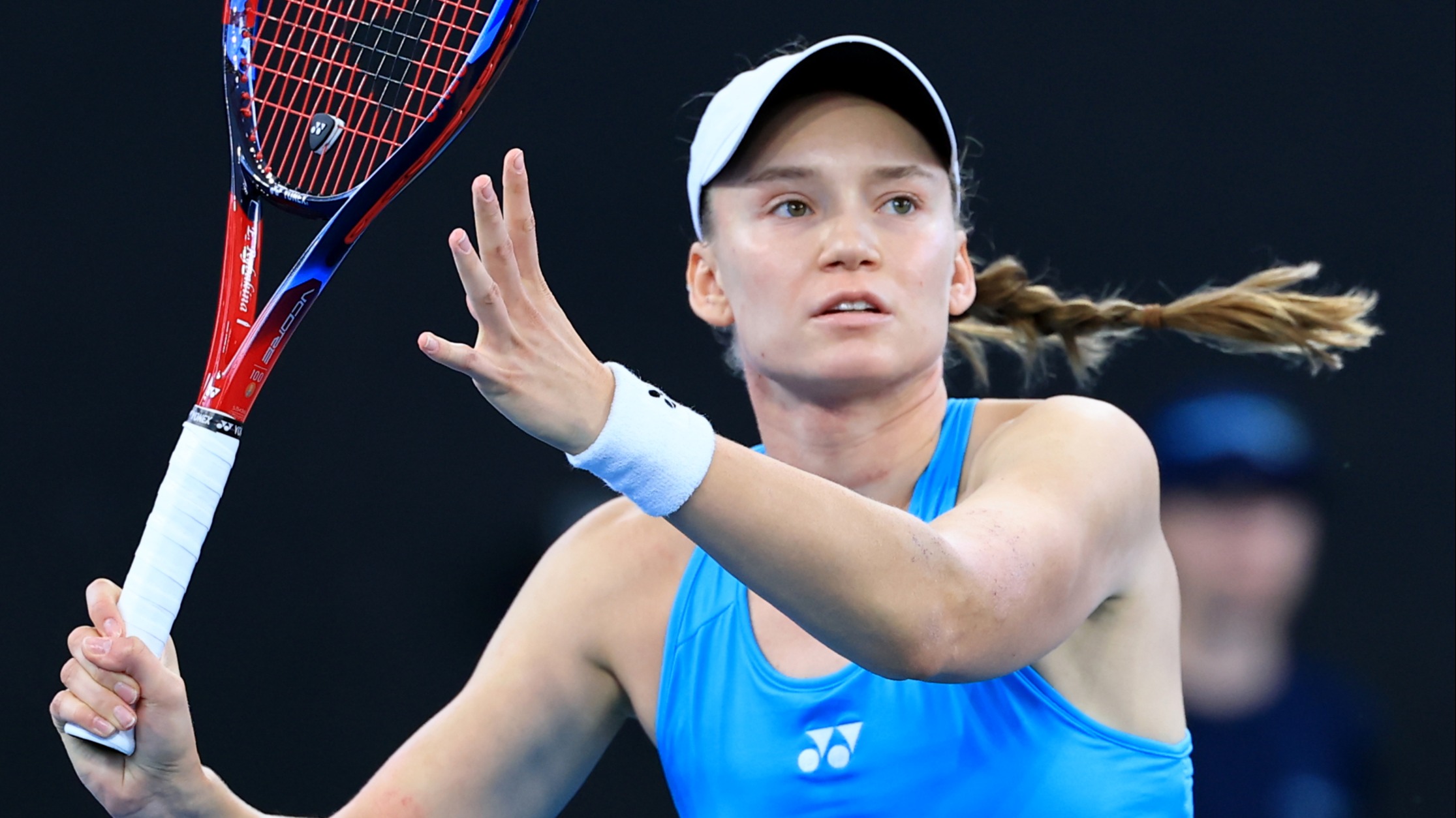 Rybakina hitting a shot