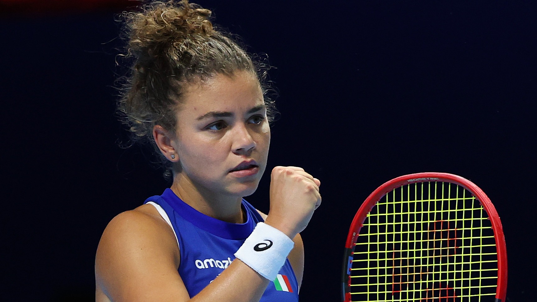 Paolini celebrates with raised fist