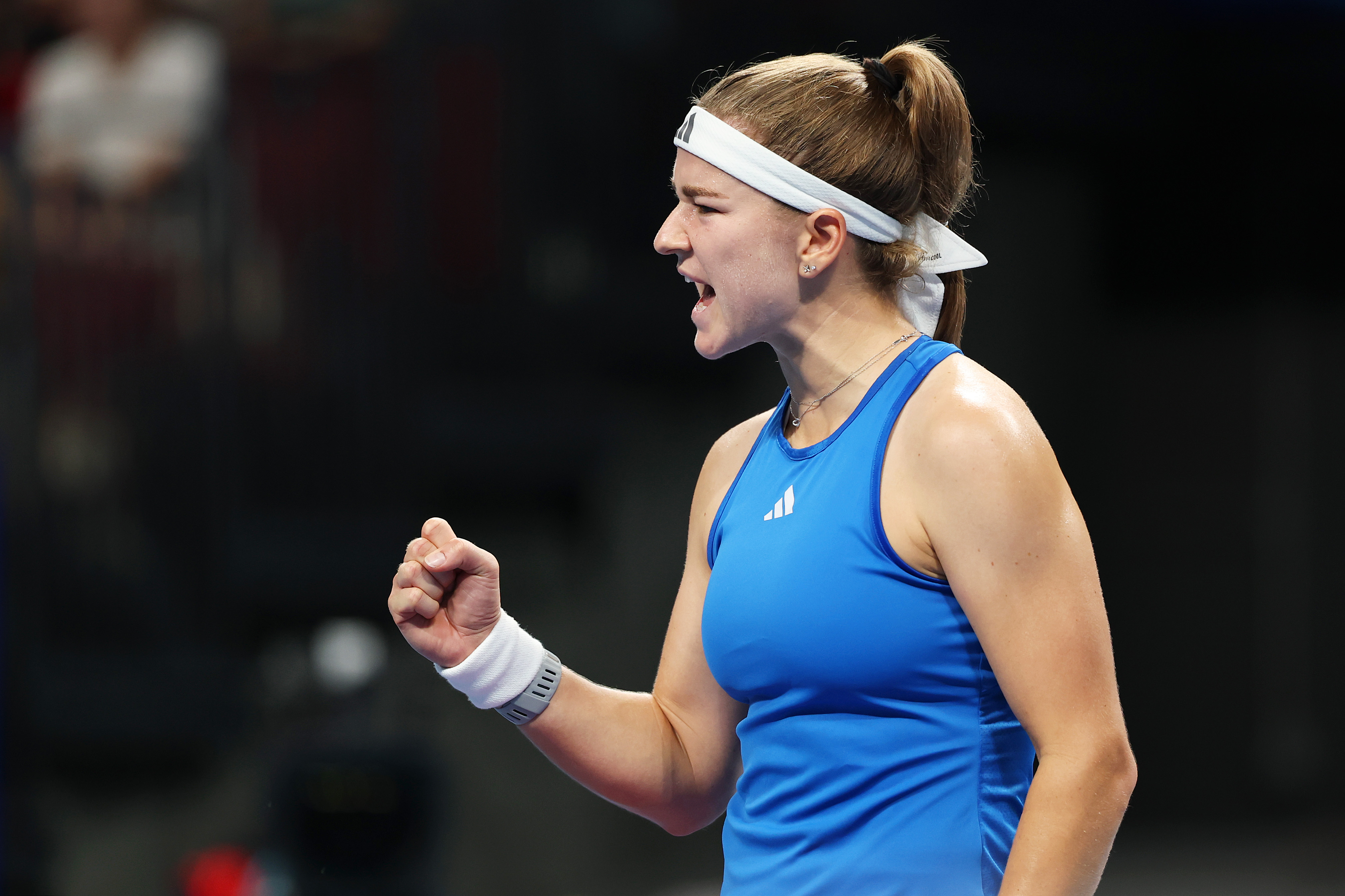 Muchova celebrates during Cze-Spa singles