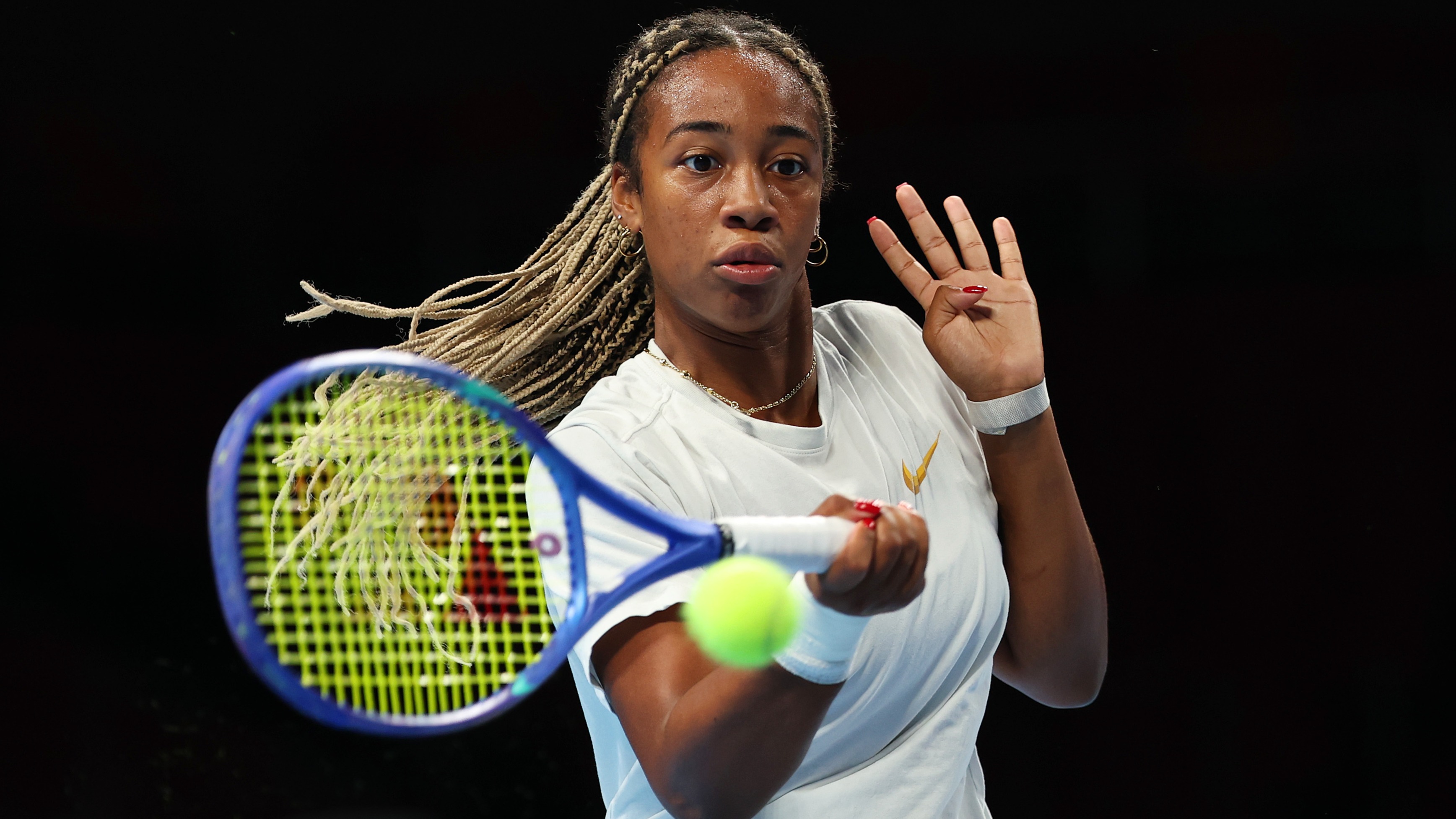 Tyra Grant plays forehand shot