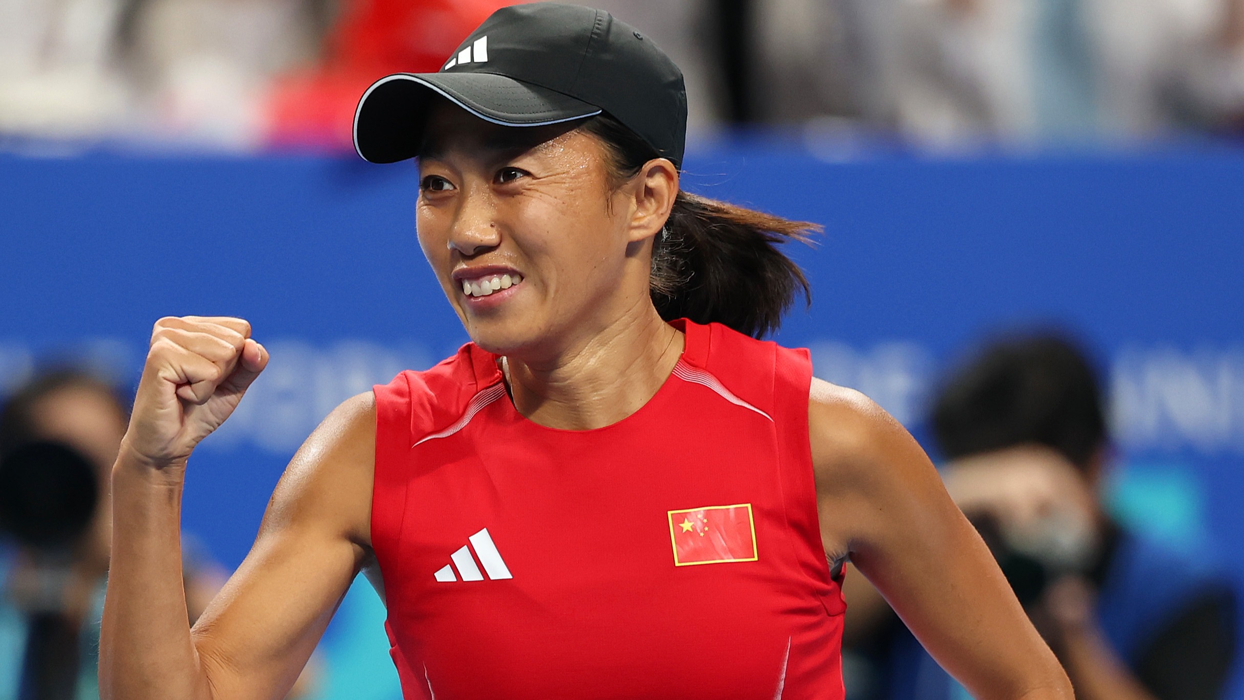 Shuai Zhang celebrates winning match one against Elisabetta Cocciaretto