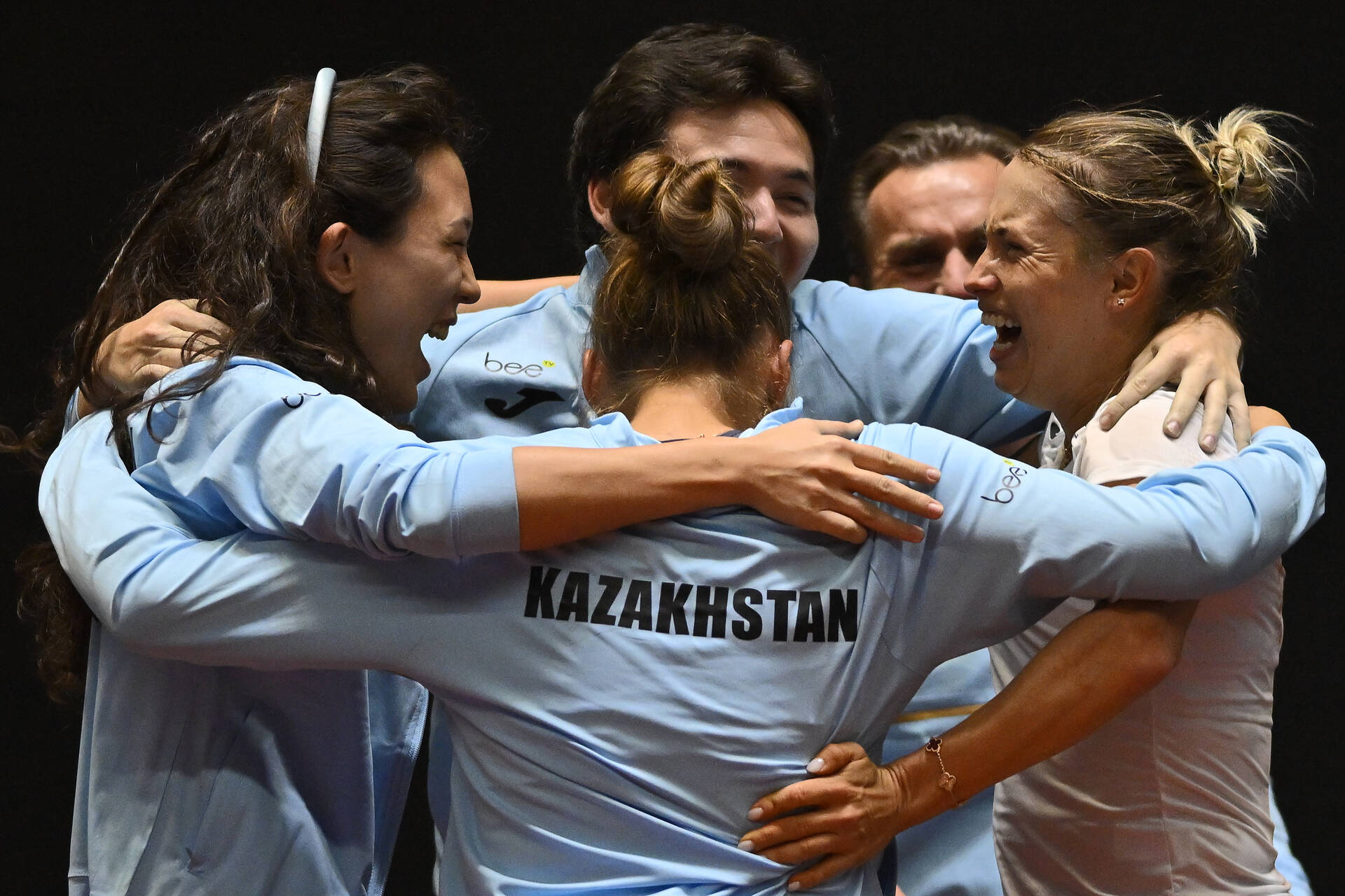 Team Kazakhstan hug at 2026 Qualifiers