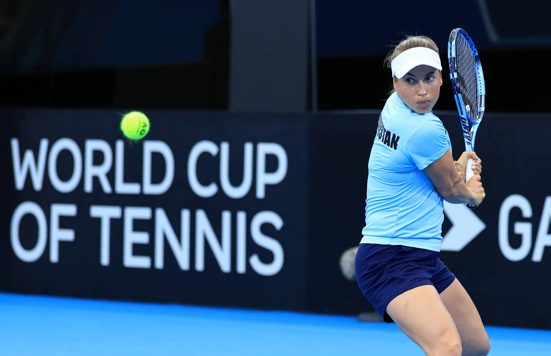 Yuilia Putintseva hits a backhand against Maya Joint