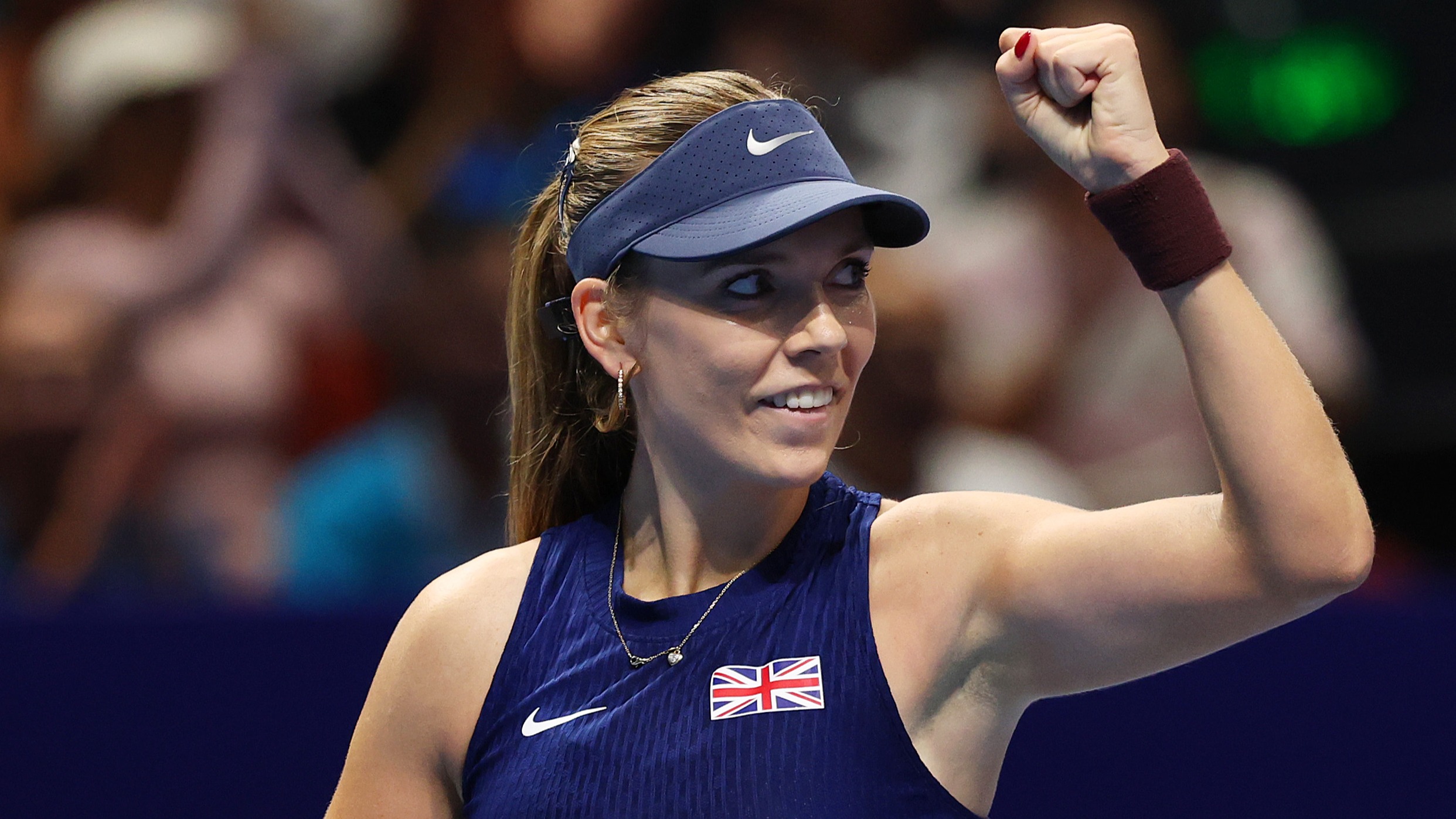 Katie Boulter with arm raised