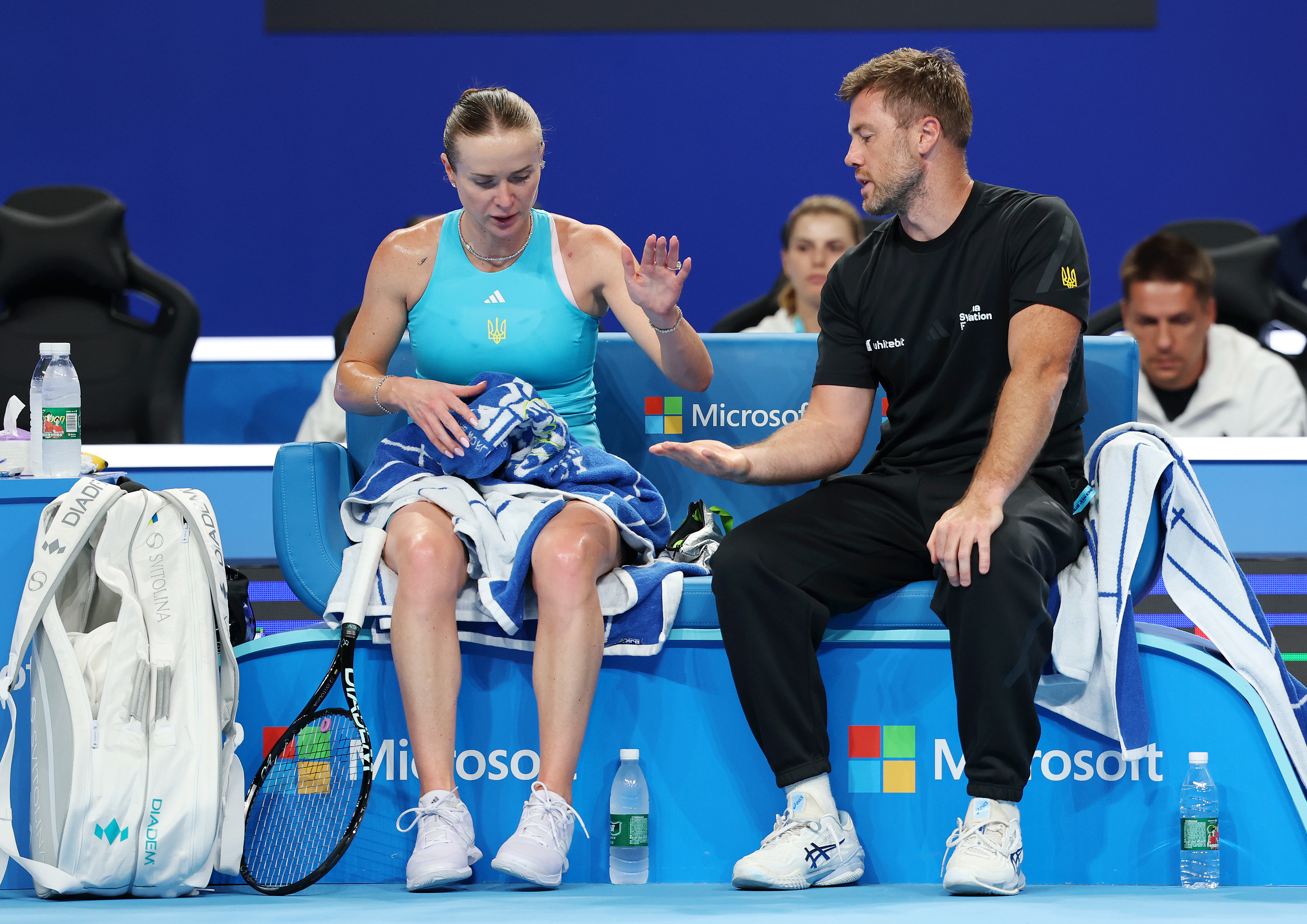 Ukraine captain Illya Marchenko talks to Elina Svitolina 