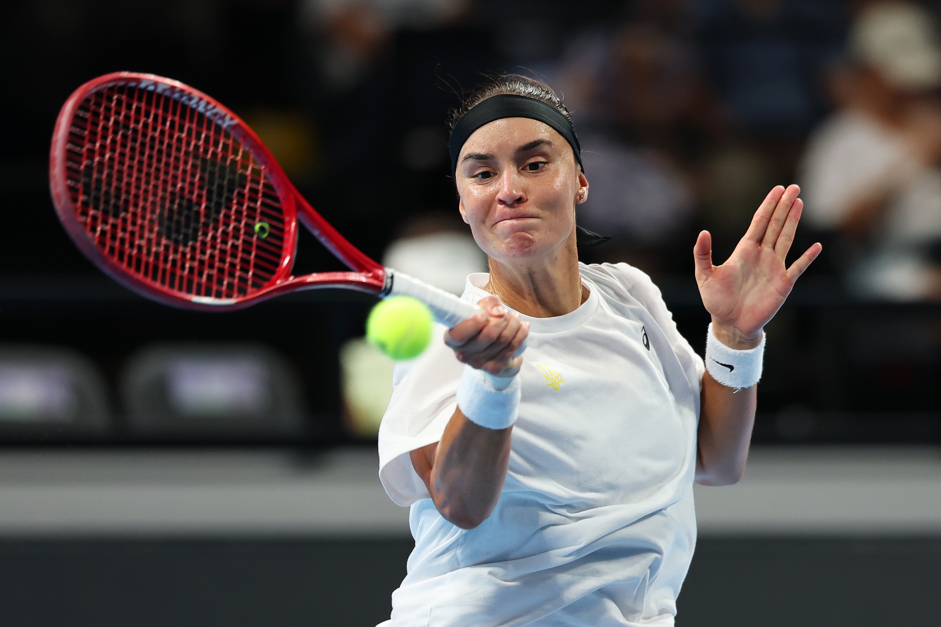 Kalinina plays forehand shot