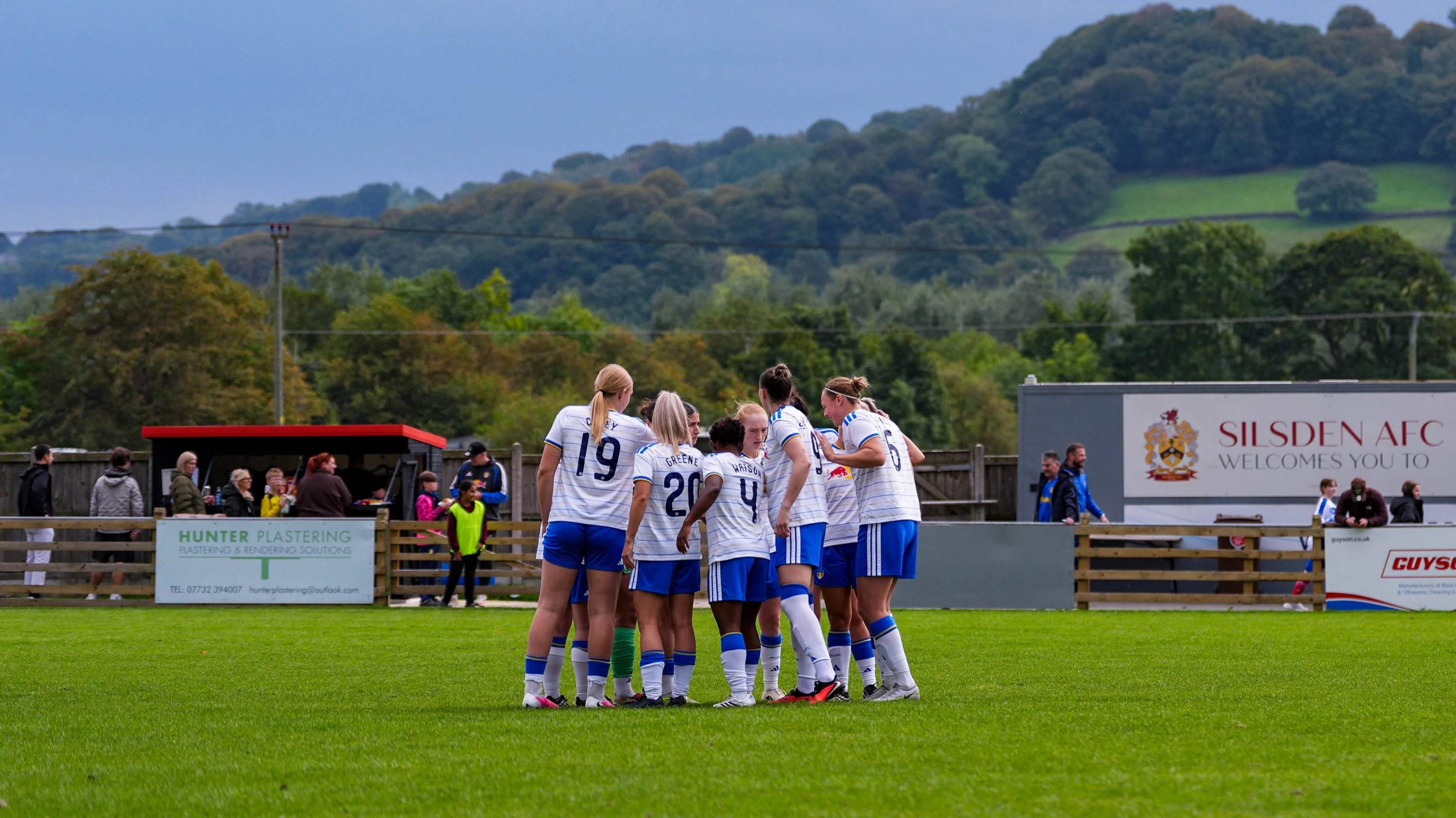 Team huddle vs Bradford City LC A Sep 26 action