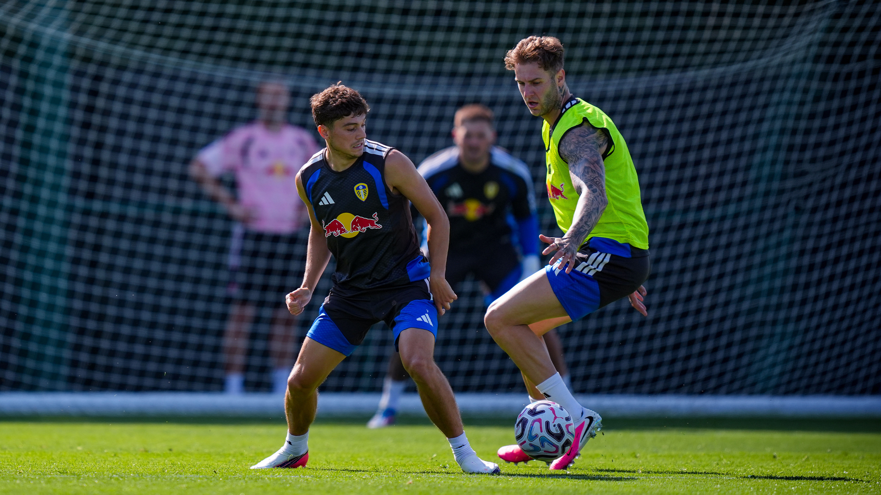 Dan James Joe Rodon Training Thorp Arch Jul 26 Challenging for Ball