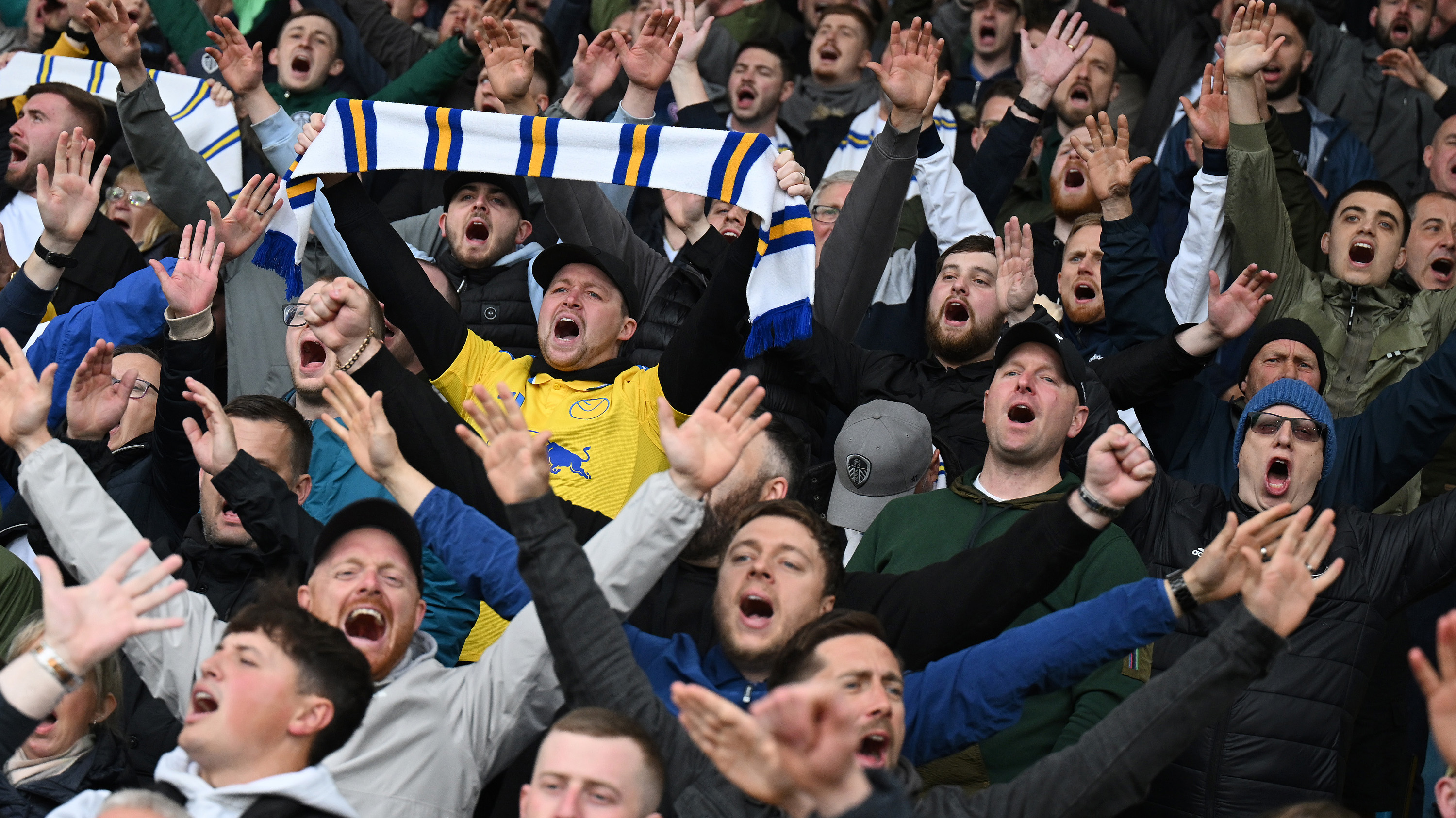 Leeds Fans April 25 Holding Scarves
