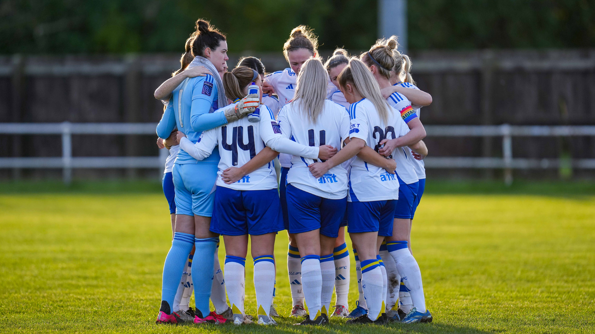 Rainbow Laces women huddle
