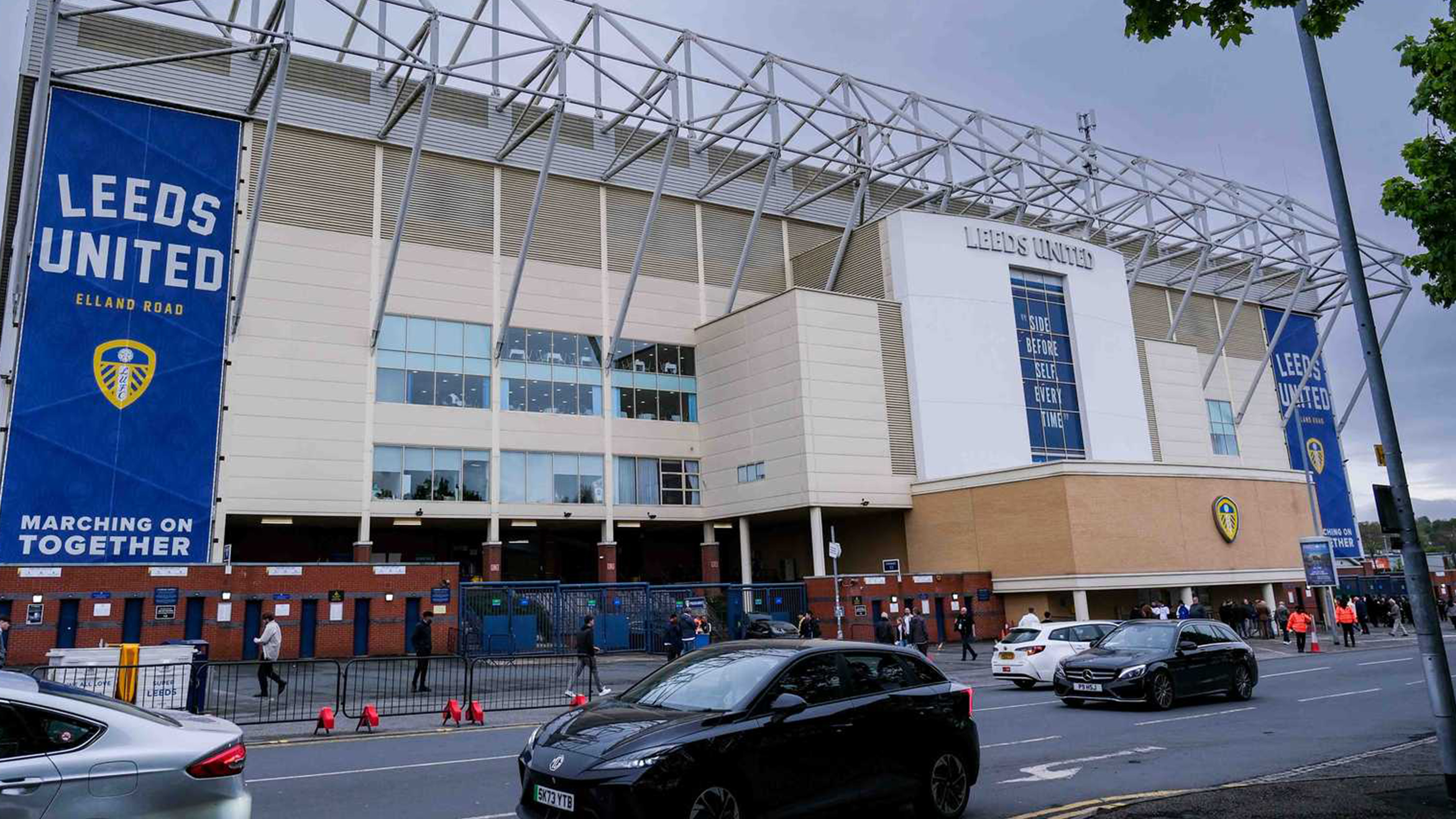 Cars Elland Road outside East Stand