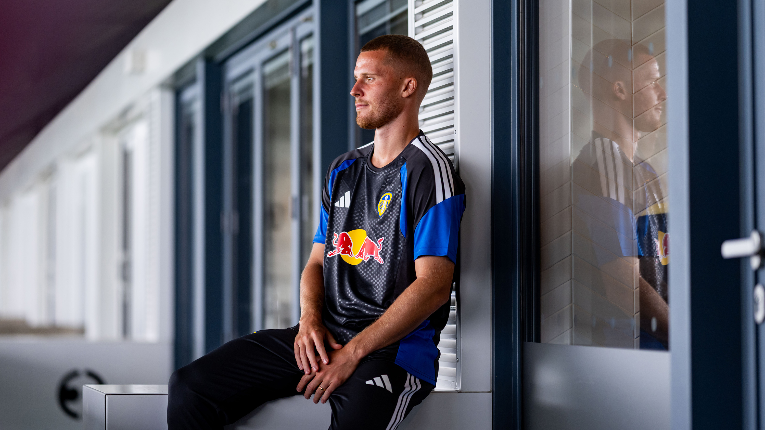 Nico Elvedi Signing Day Aug 26 Sat on Elland Road balcony