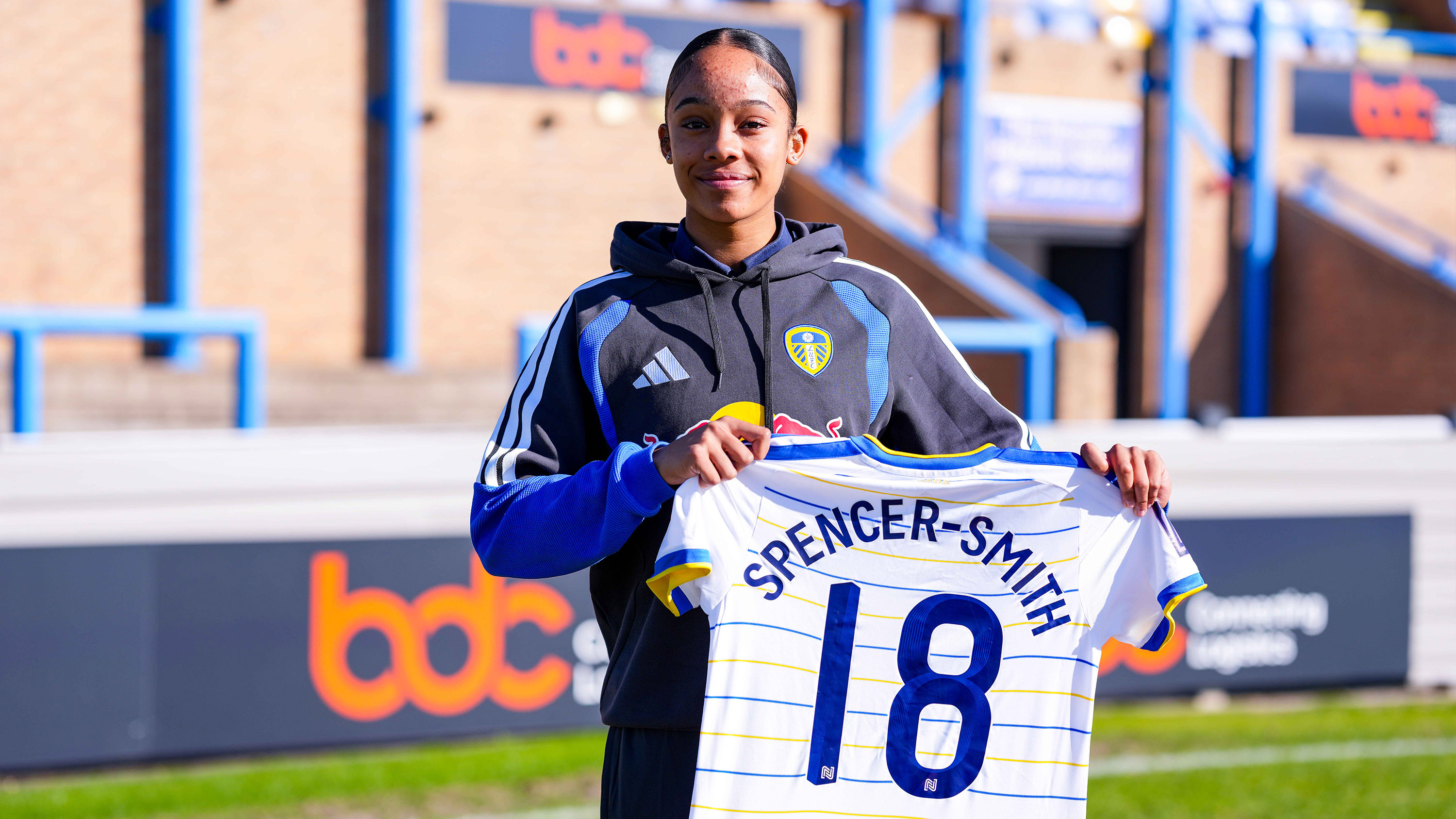 Ava Spencer-Smith Signing Norton (H) Oct 11 Holding Shirt
