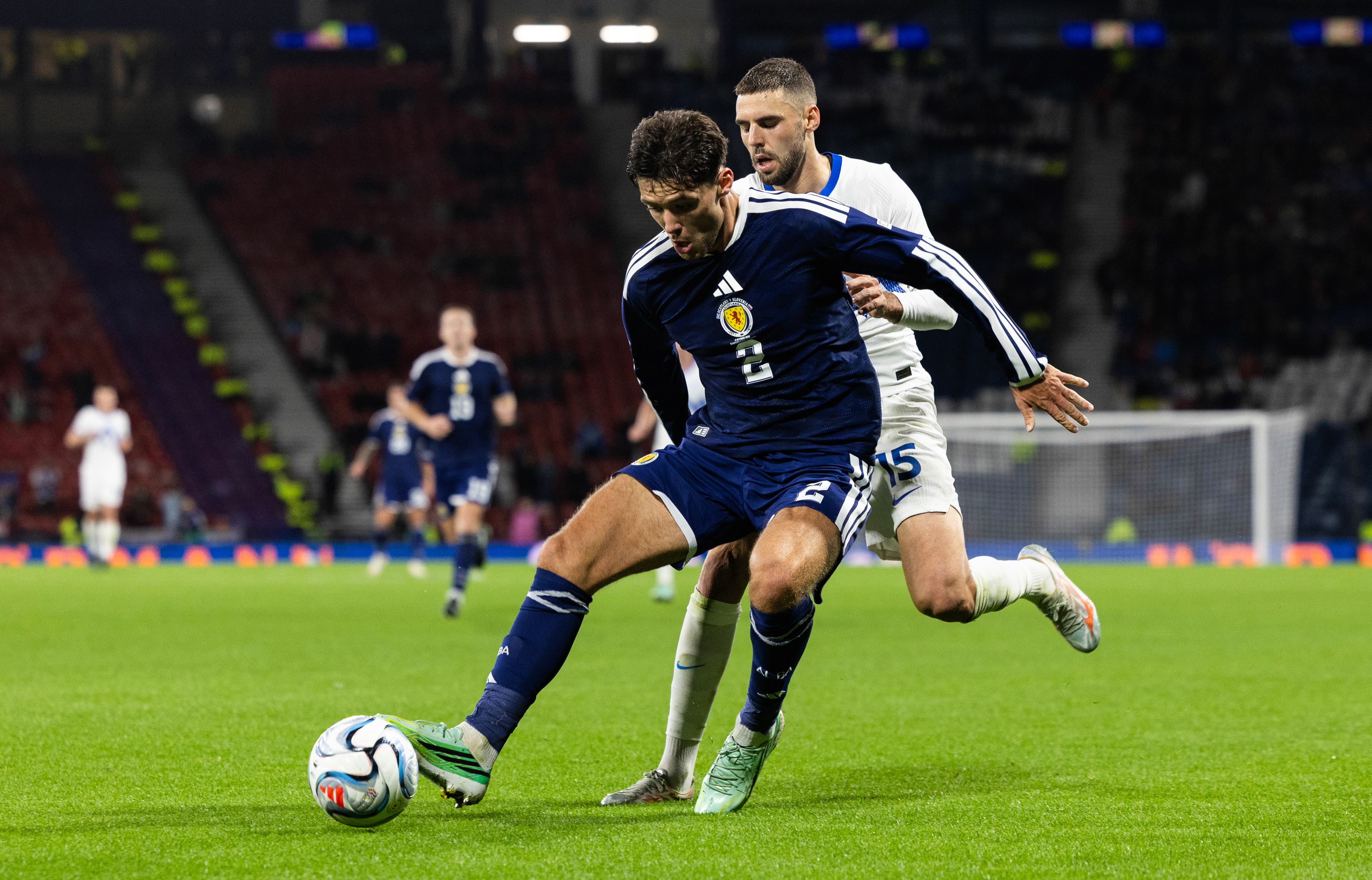 Aaron Hickey in action for Scotland