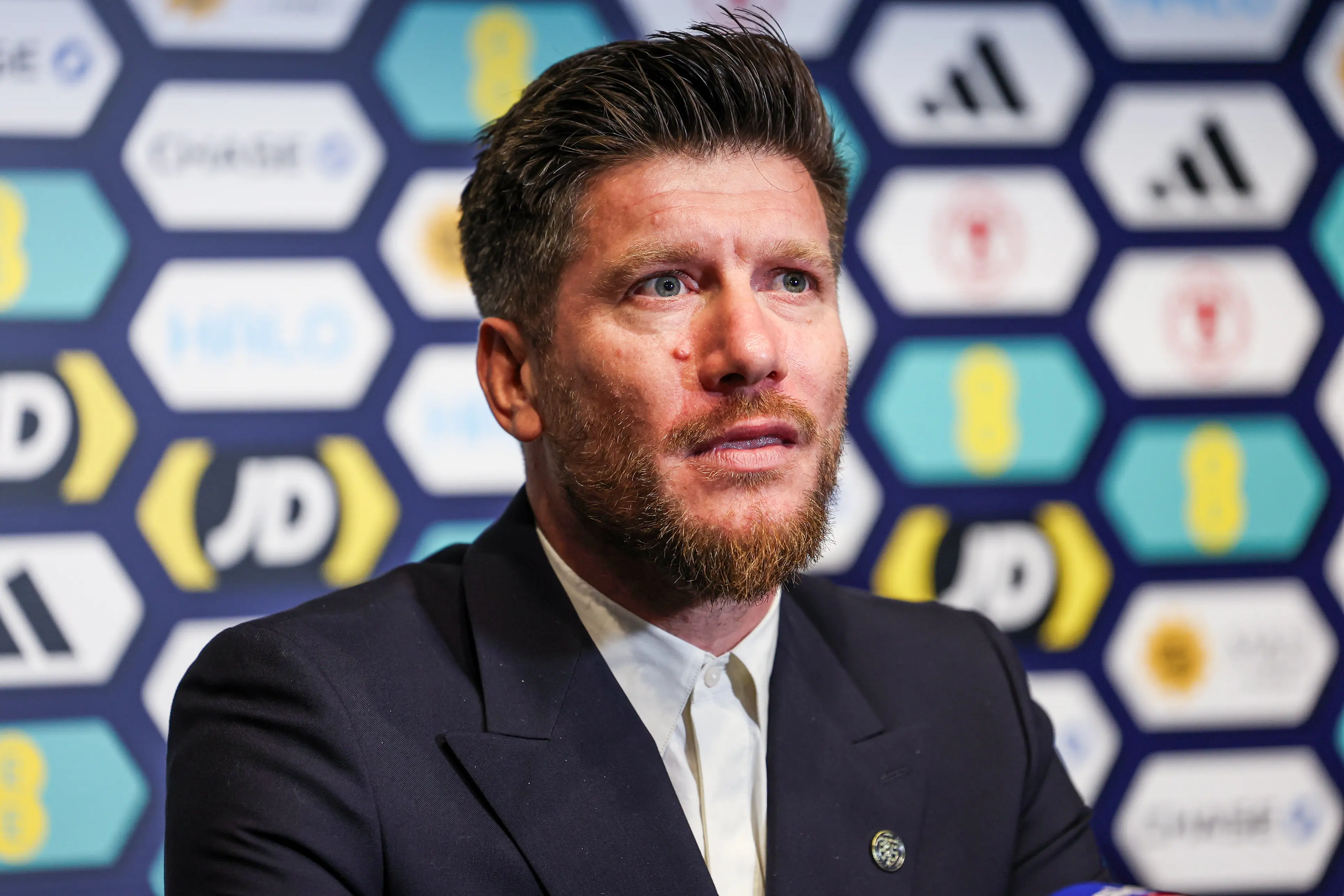 Sébastien Pocognoli addresses the media at Scotland's MD-1 Press Conference