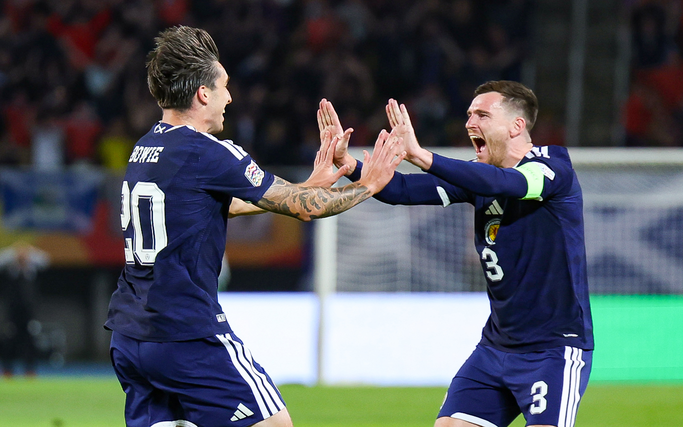 Scotland's Kieron Bowie celebrates scoring to make it 1-0 with teammate Andy Robertson