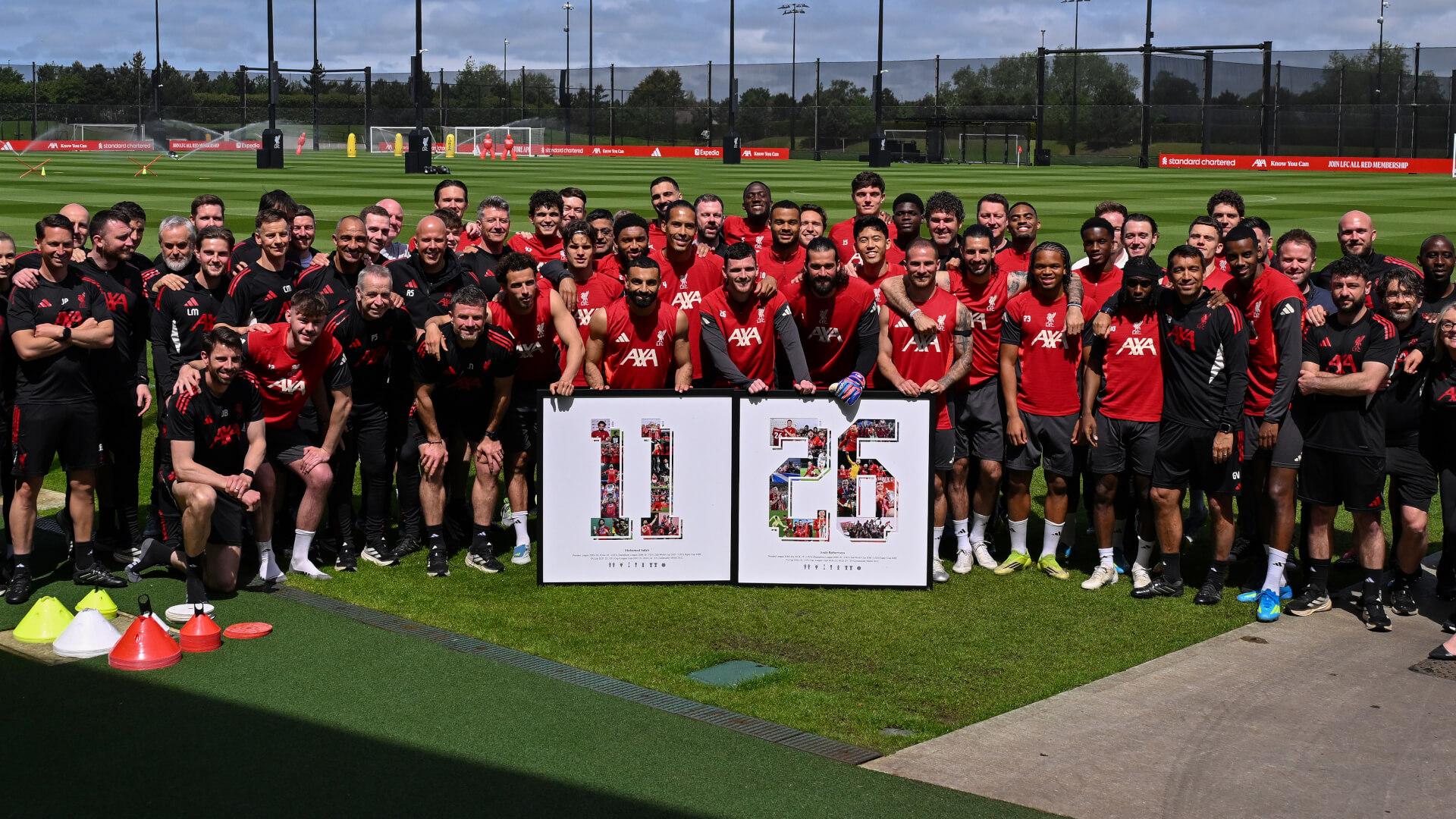 Reds squad present framed mementos to Andy Robertson and Mo Salah