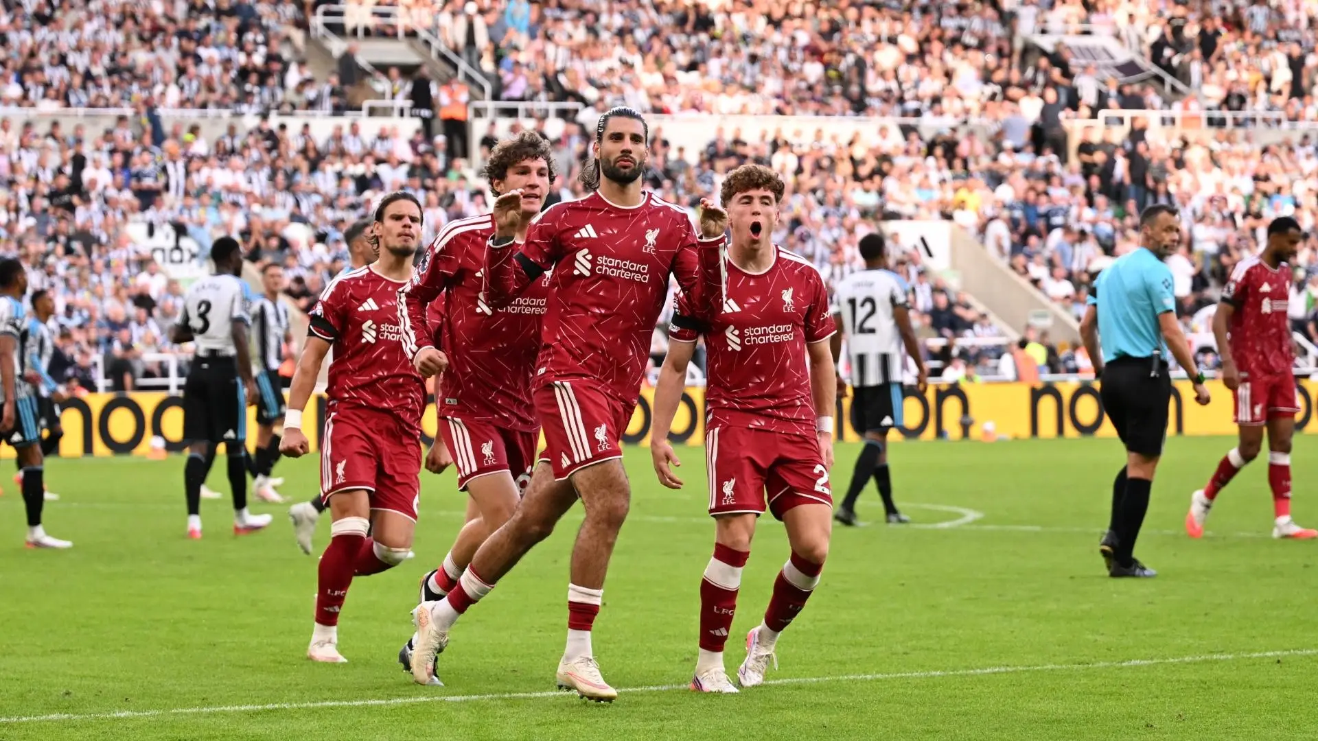 Szoboszlai scores late penalty to rescue point for Liverpool in season opener at Newcastle