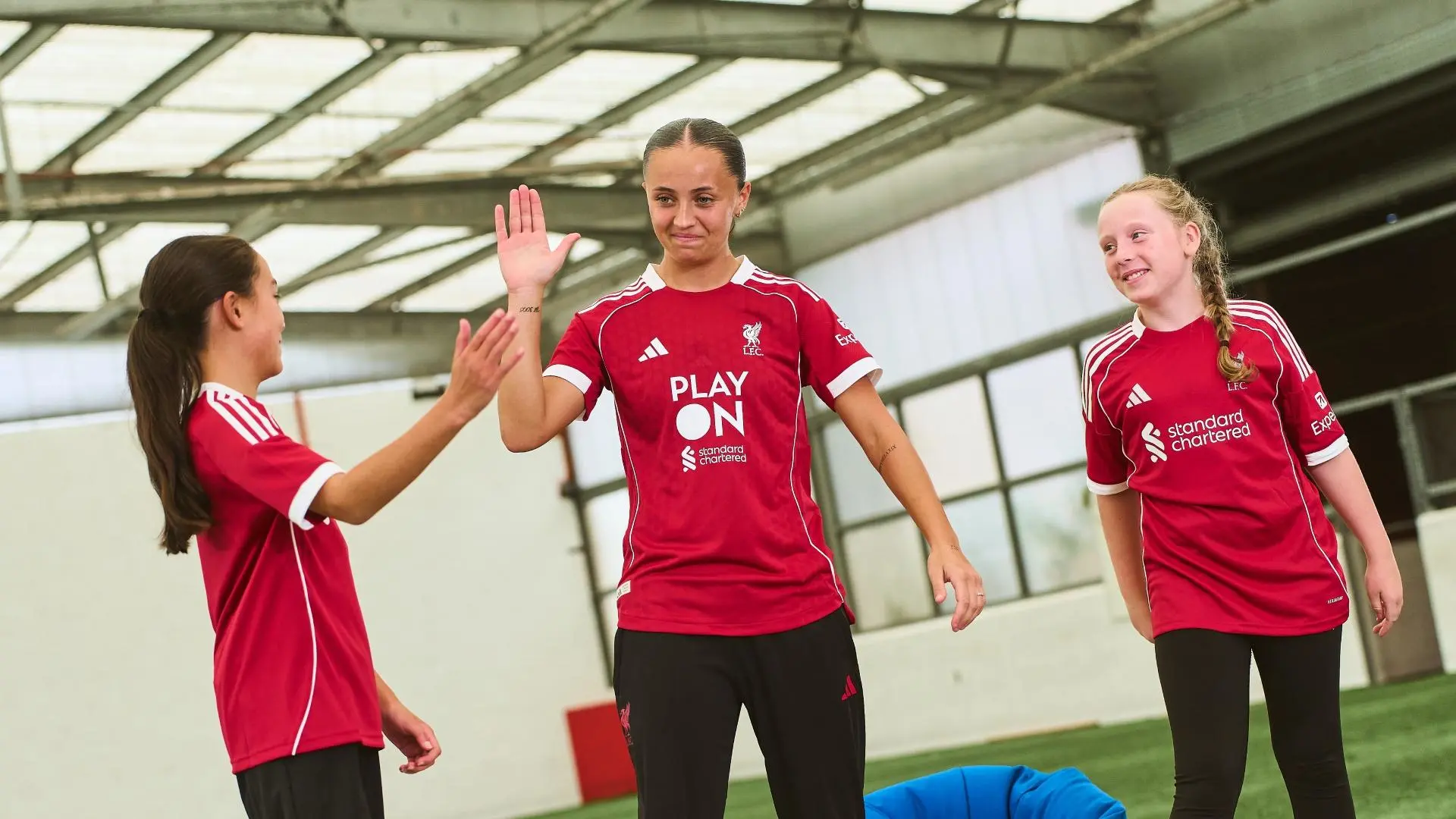 LFC and Standard Chartered spotlight 'Play On' with special front-of-shirt logo swap