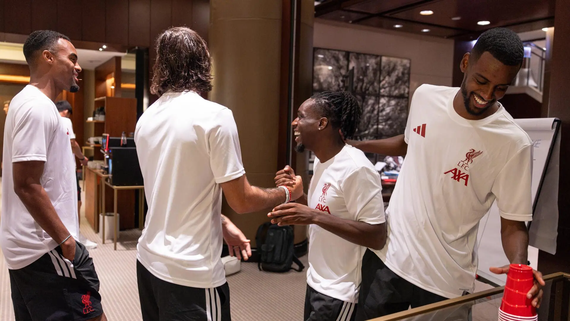 Watch: Liverpool players compete in cup stack challenge