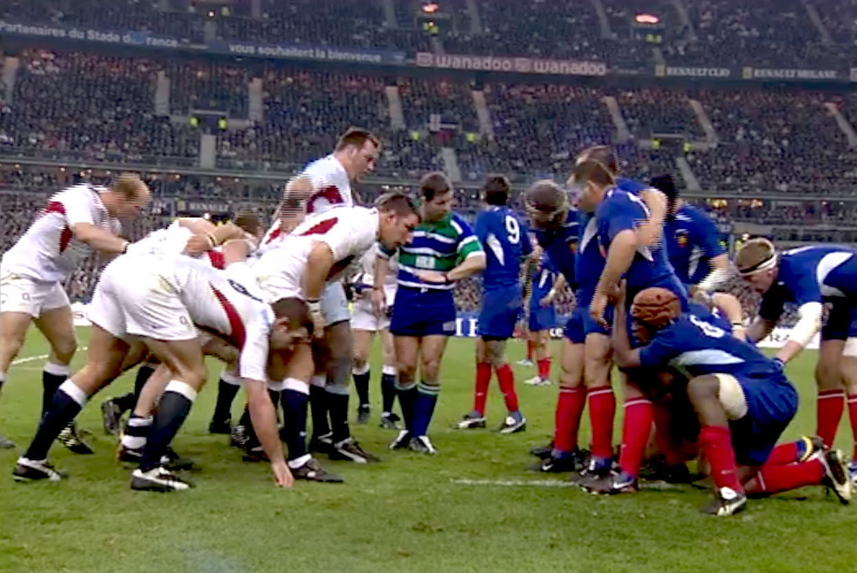 The French and England forwards prepare to pack down for a scrum during the 2004 Championship decider in Paris.