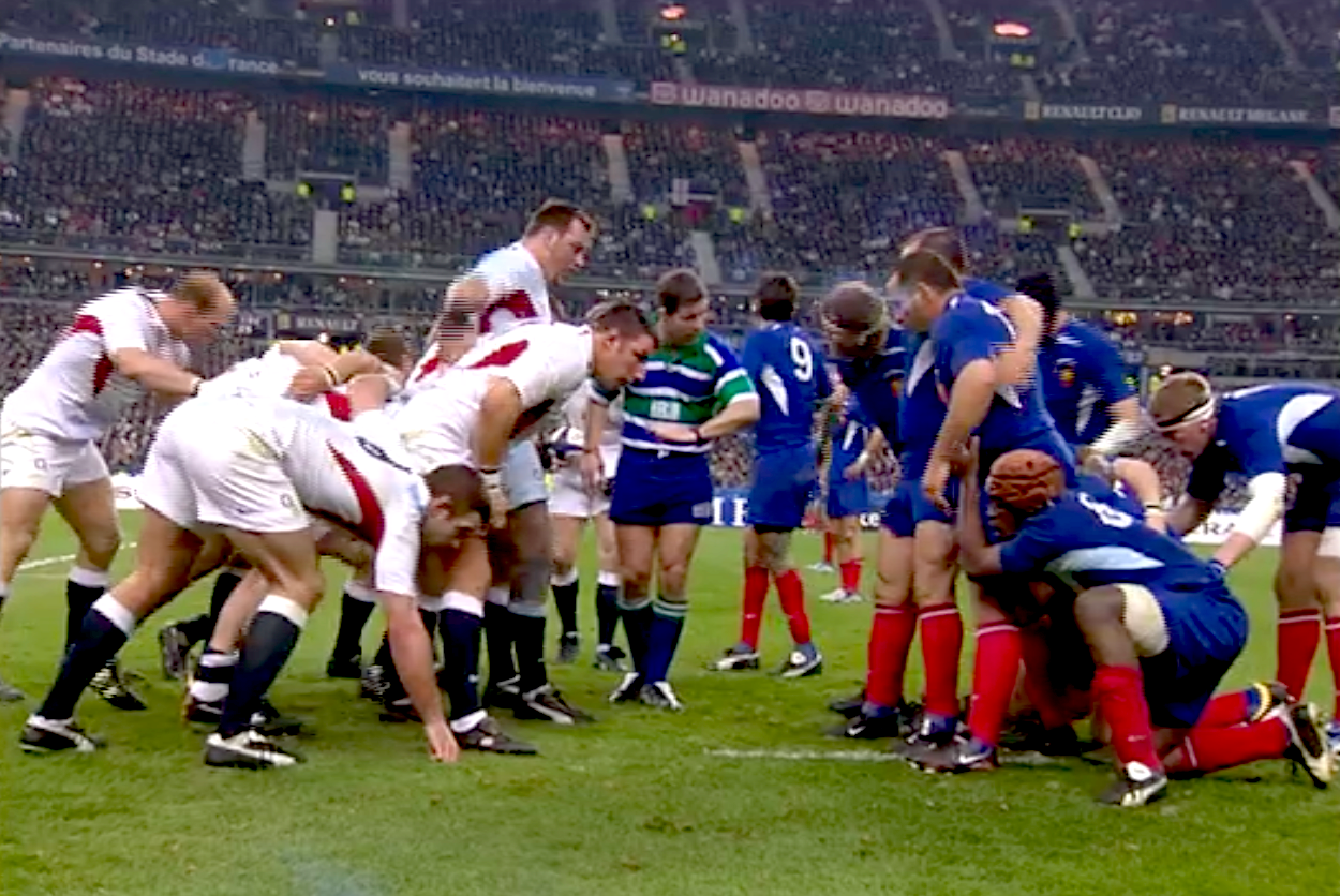 The French and England forwards prepare to pack down for a scrum during the 2004 Championship decider in Paris.
