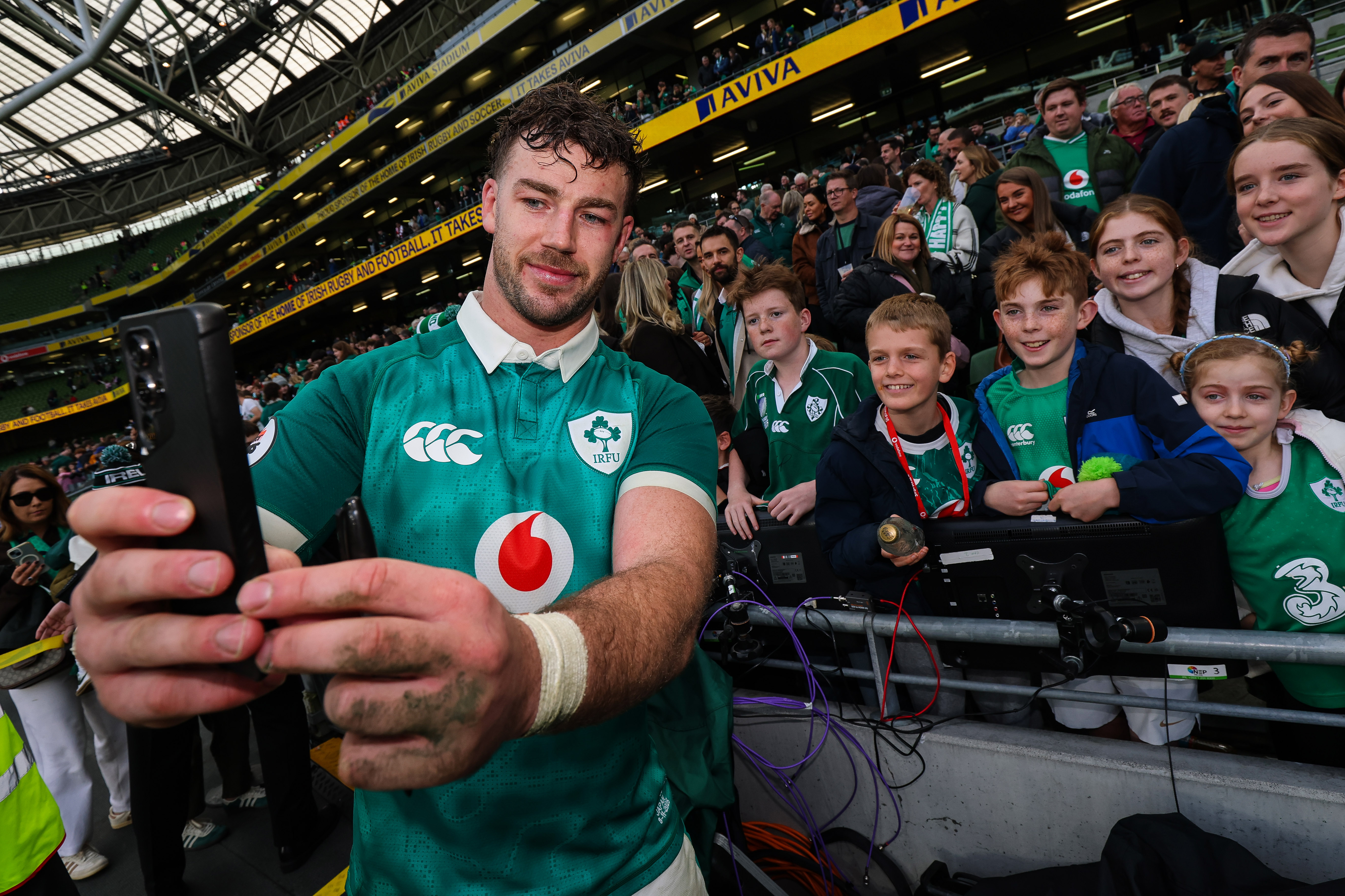 Caelan Doris takes a selfie with fans at the Aviva Stadium during the 2025 Championship.