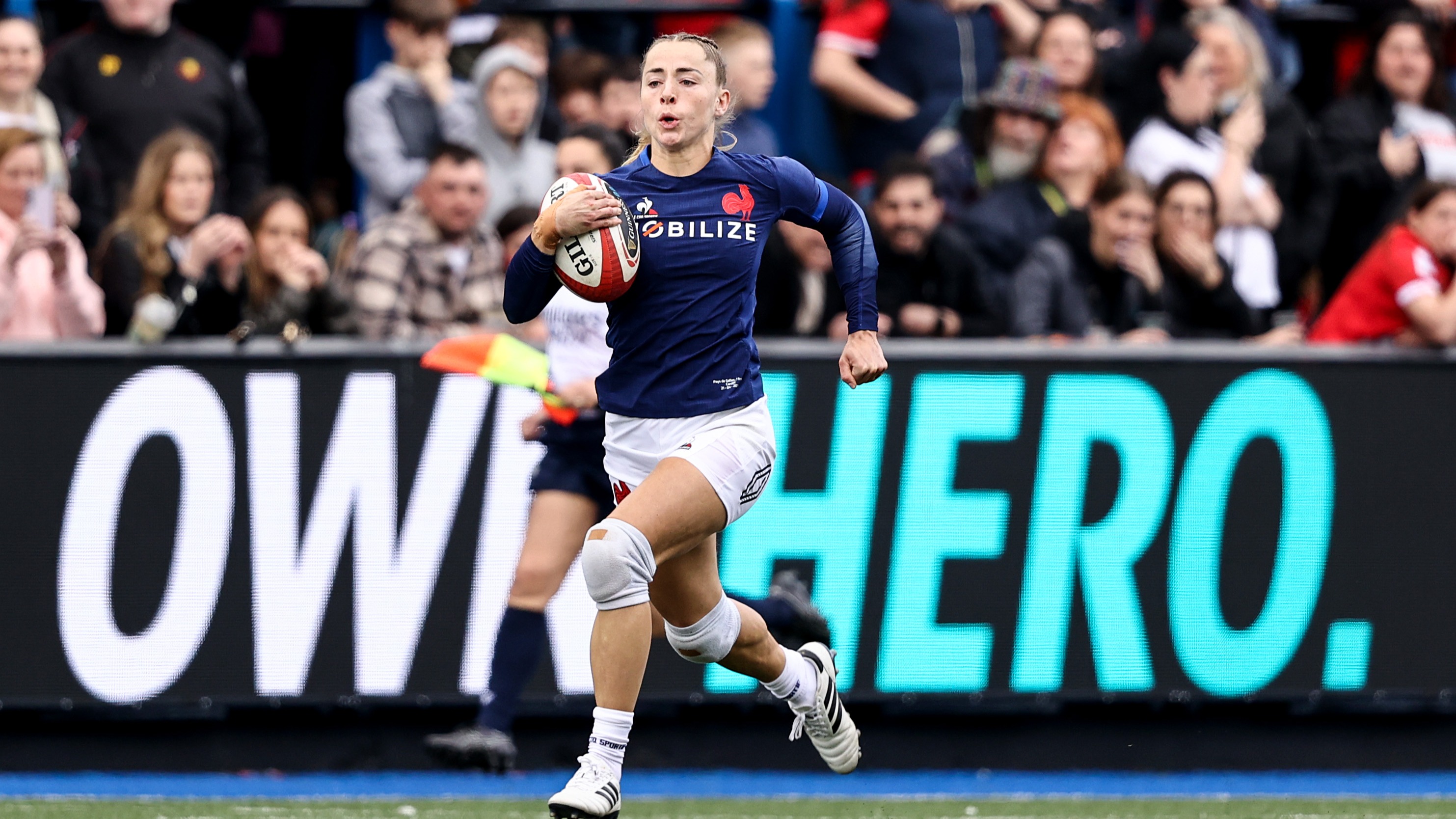 France's Joanna Grisez makes a break to score her team's second try during the 2024 Guinness Women's Six Nations Championship.