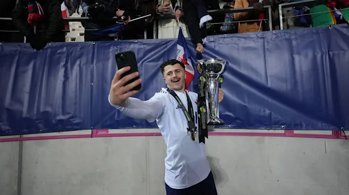 Jon Echegaray of France takes a selfie with the trophy following their 2025 Under 20 Six Nations Championship title triumph.