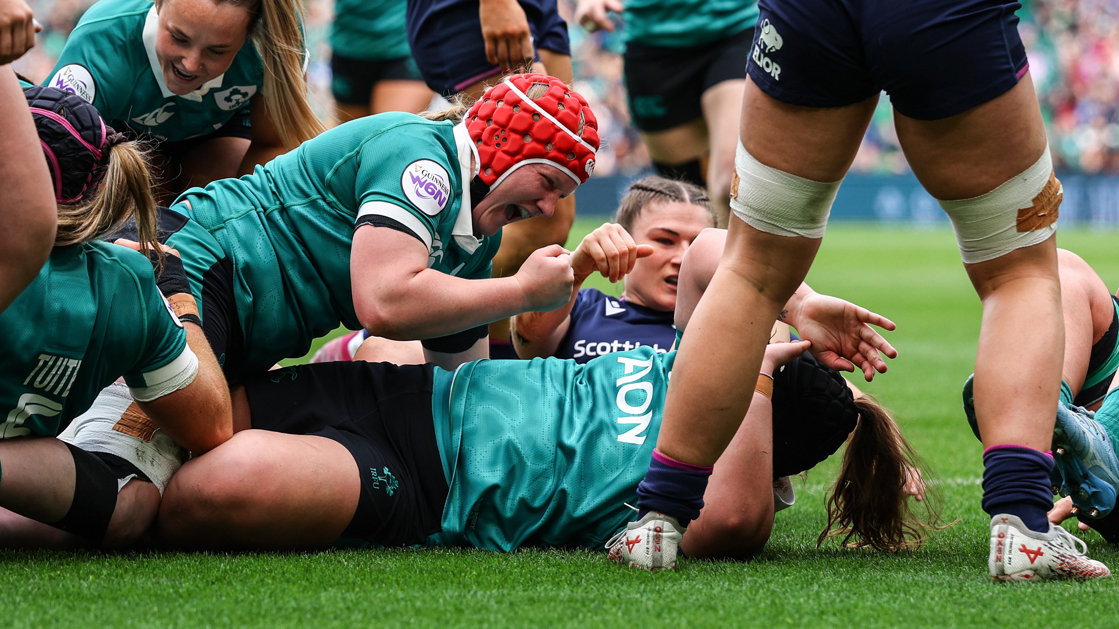 Ireland's Aoife Wafer celebrates after Cliodhna Moloney-MacDonald scores a try during the 2026 Guinness Women's Six Nations Championship Round 5 game against Scotland in Aviva Stadium, Dublin.
