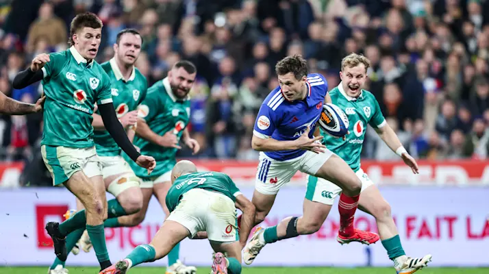 France's Baptiste Serin evades the Irish defence during the 2026 Guinness Men's Six Nations opener in Paris.