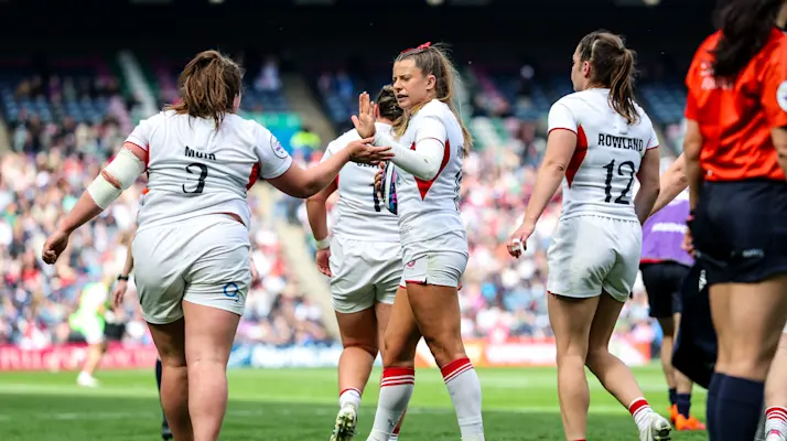England's Zoe Harrison and Maud Muir celebrate a try