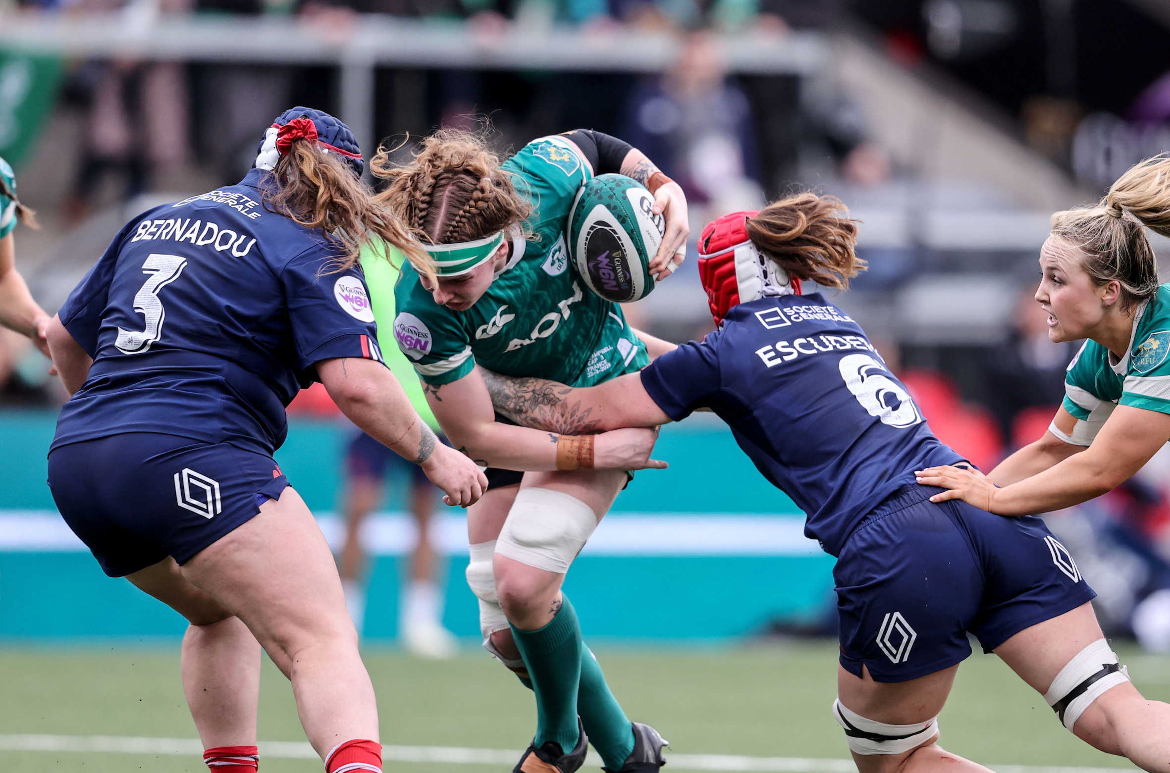 Ireland's Ruth Campbell is tackled by France's Charlotte Escudero during the 2025 Guinness Women's Six Nations Championship Round 1 game between Ireland and France in the Kingspan Stadium, Belfast
