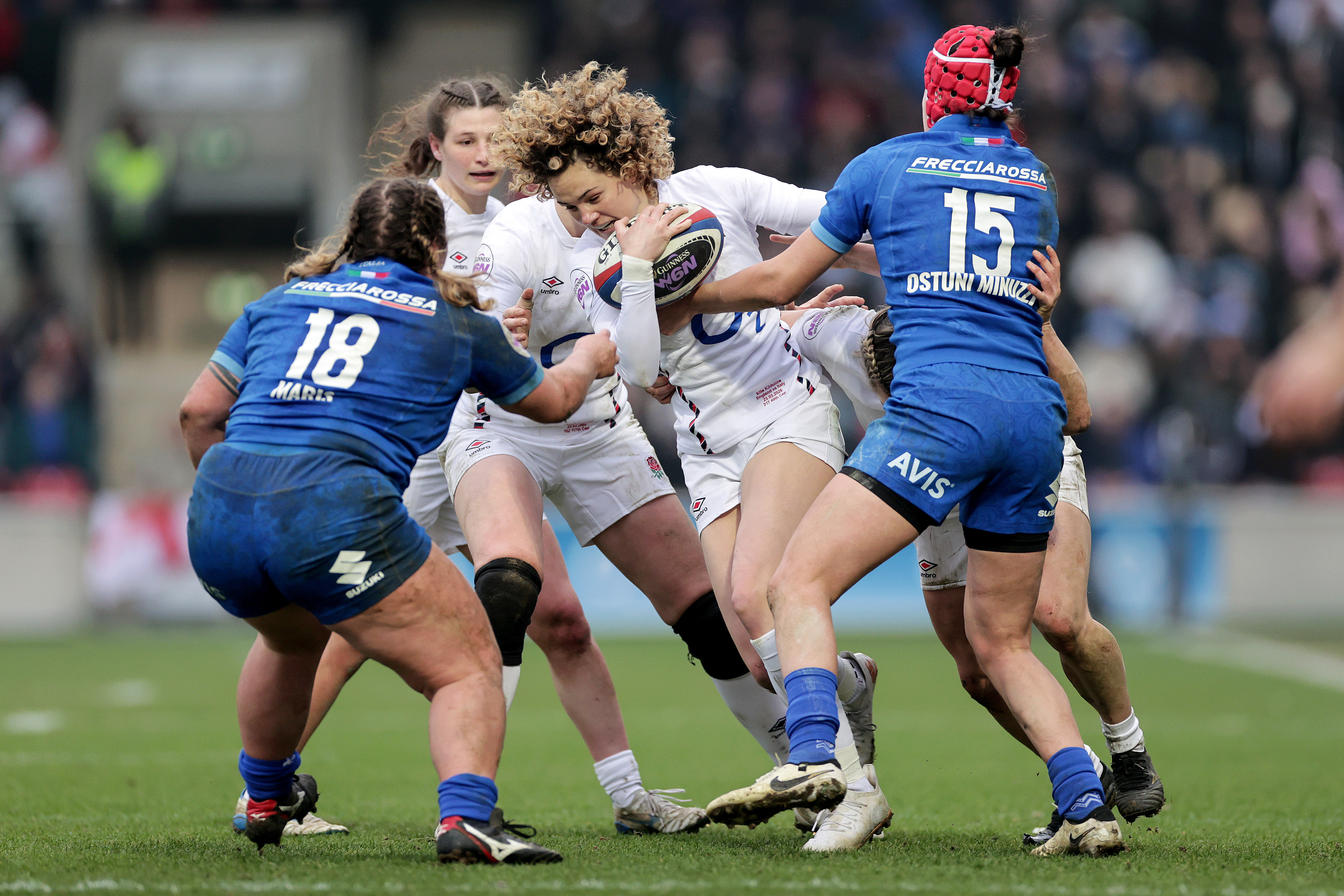 Ellie Kildunne is tackled by Gaia Maris and Vittoria Ostuni Minuzzi during the 2025 Guinness Women's Six Nations Championship Round 1 game between England and Italy in the LNER Community Stadium, York
