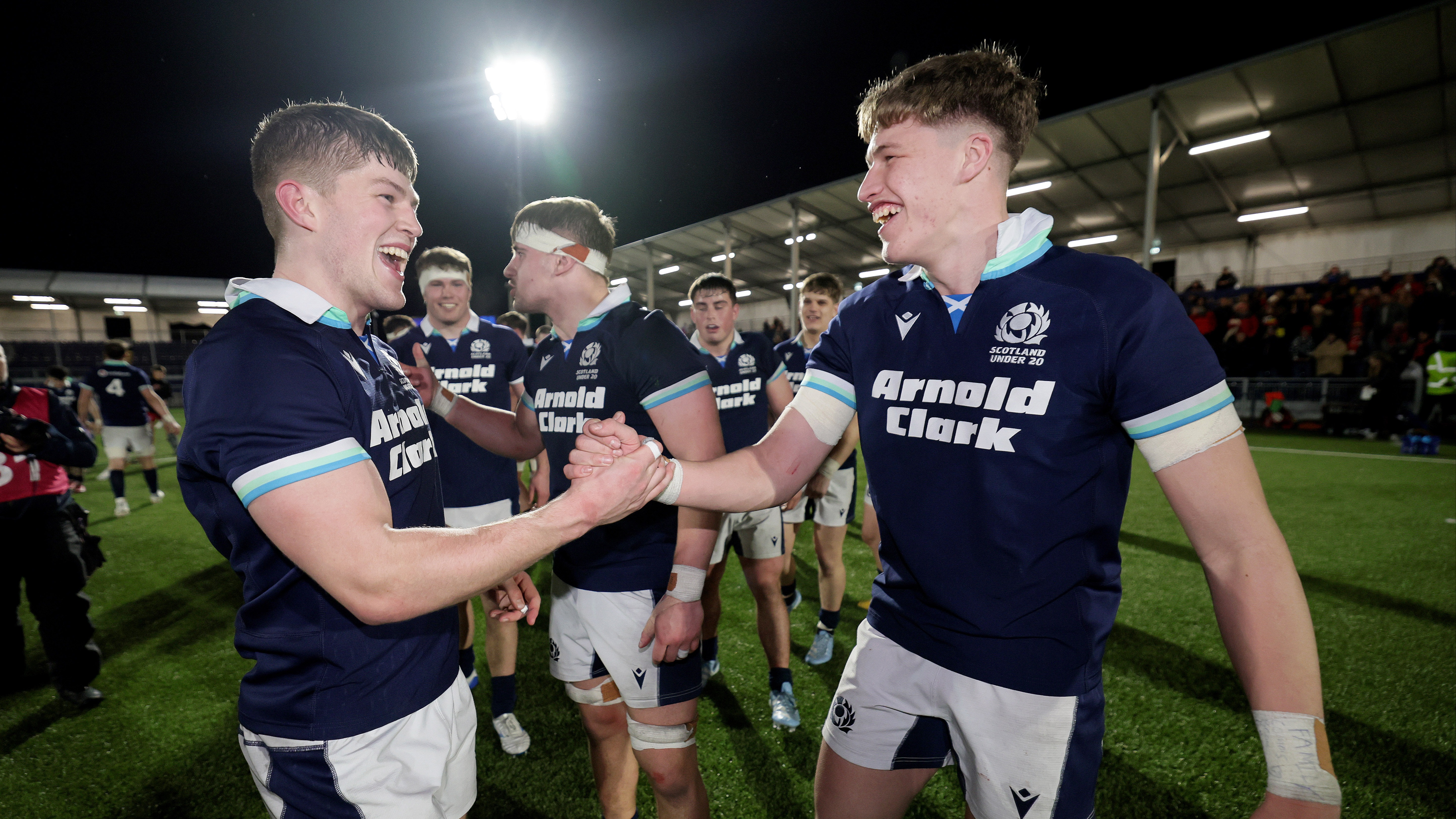 Scotland's Angus Hunter and Jack Brown celebrate after the 2025 U20 Six Nations victory against Wales in Hive Stadium, Edinburgh.