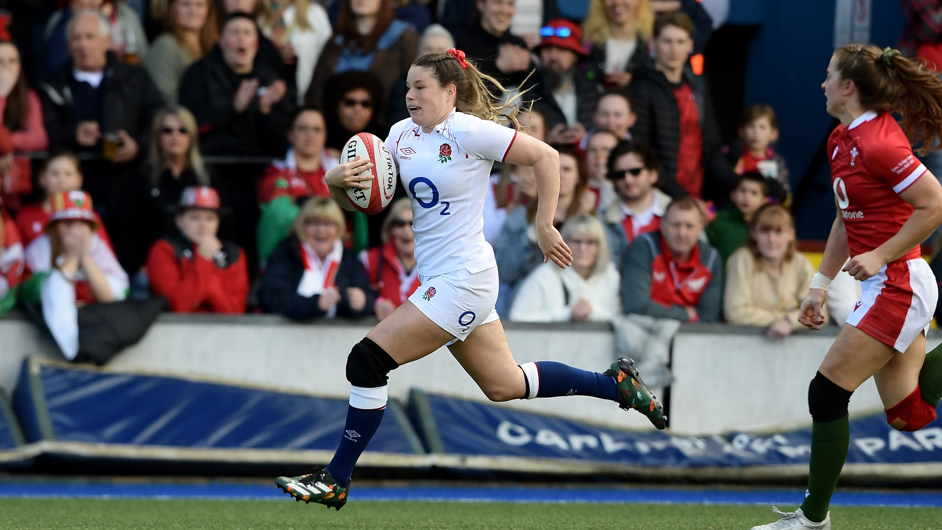 Jess Breach runs in a try against Wales in the 2023 Championship