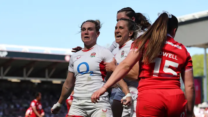 England's Meg Jones celebrates with teammates after scoring her sides fourth try of the match during the 2026 Guinness Women's Six Nations Championship Round 3 game between England and Wales in Ashton Gate Stadium