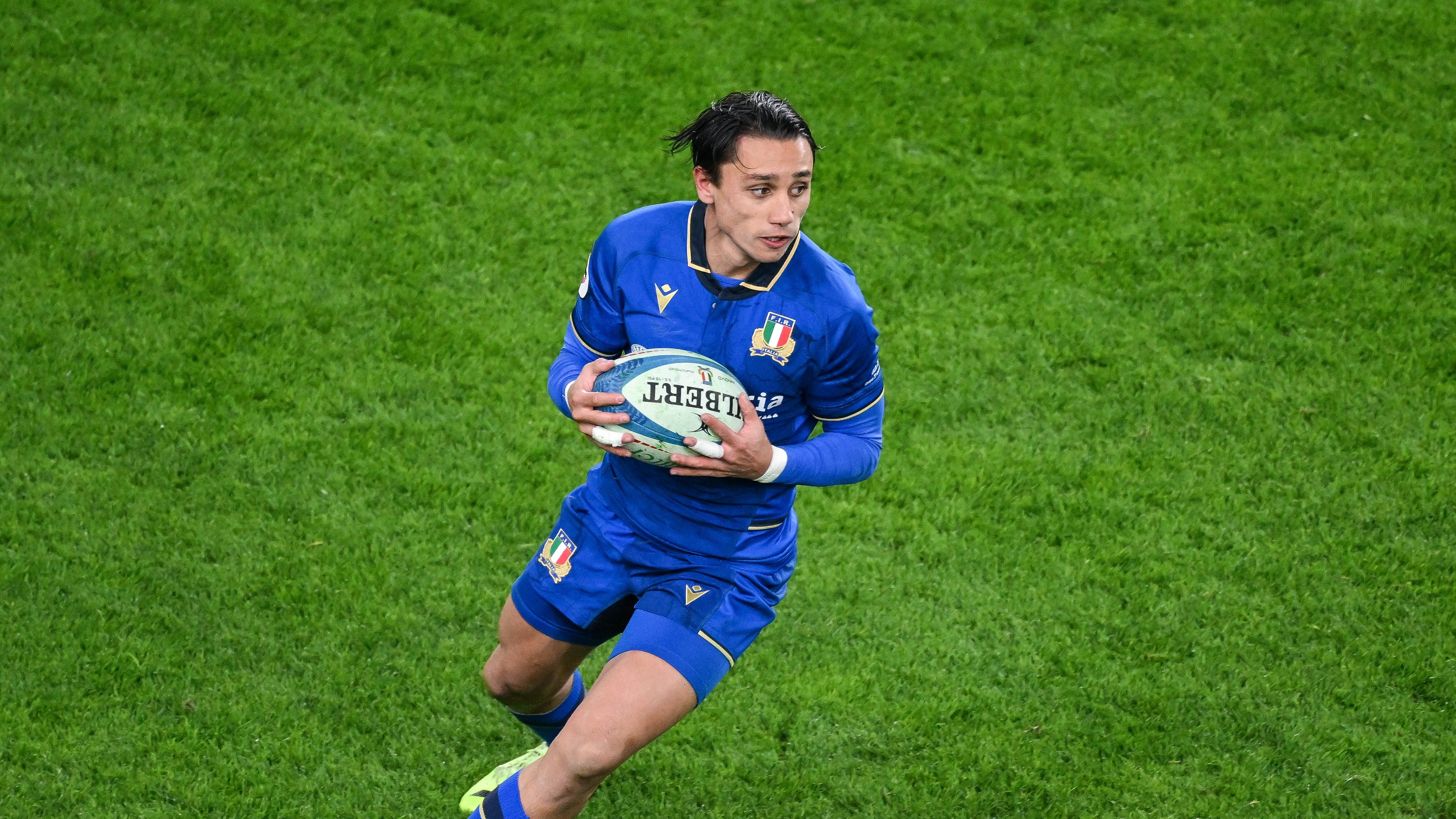 An aerial shot of Ange Capuozzo with ball in hand during the 2025 Quilter Nations Series.